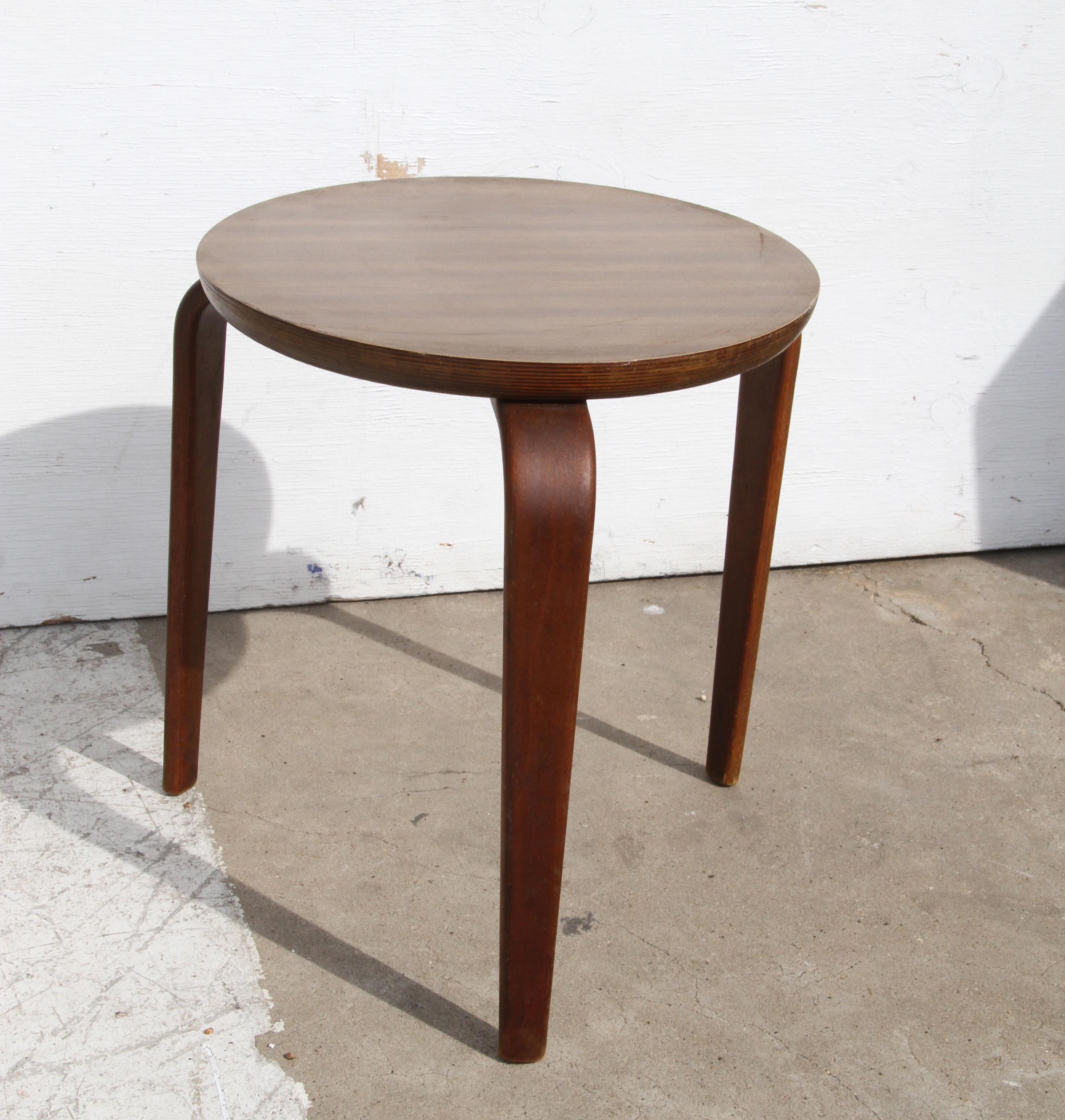 Wood stool or side table by Thonet, New York and attributed to Joe Atkinson as designer. A circular top and bentwood legs.  
 
Marked Thonet
Height: 17 in  
Diameter: 15 in Overall: 19 in
Seat Height: 17 in  