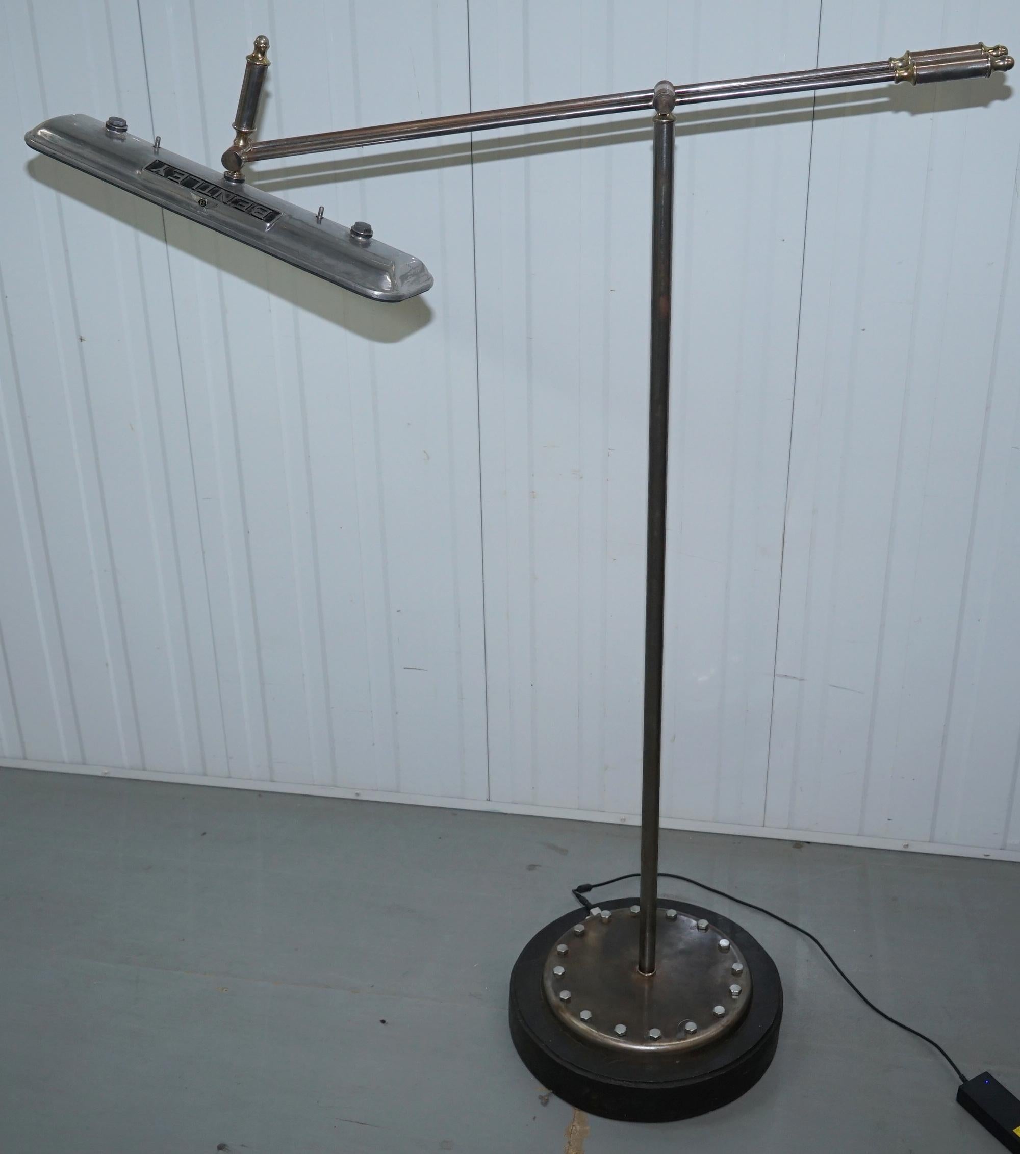 We are is delighted to offer for sale this vintage one of a kind Bentley angle poise articulated floor standing lamp

I have a smaller version with a Rolls Royce shade that is listed under my other items 

This lamp is a one of a kind custom