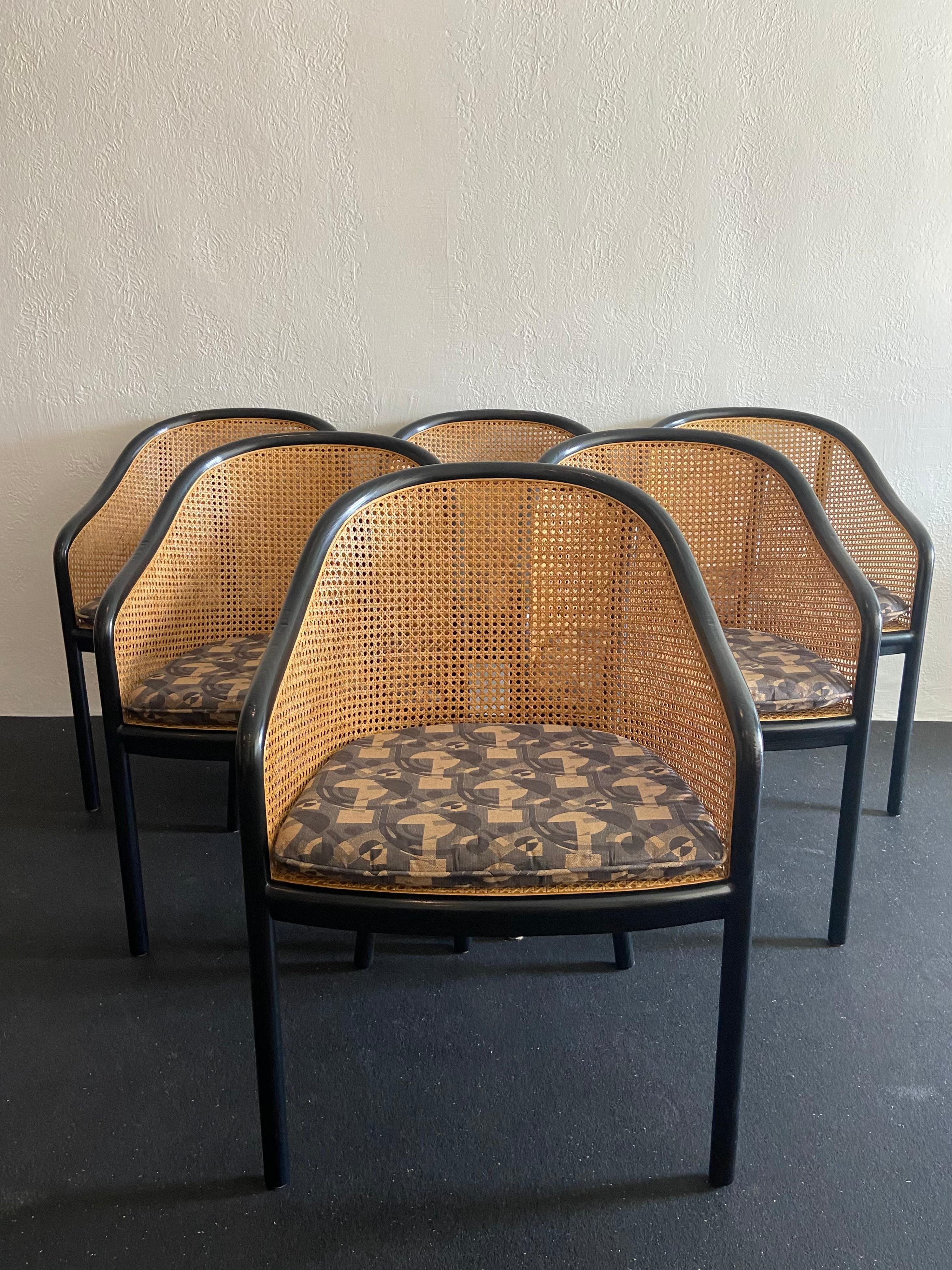 Set of 6 ebonized bentwood and cane chairs by Ward Bennett for Brickel Associates. Found in original finish and custom commissioned Lee Jofa fabric. The arms have been touched up to cover wear from previous use with dining table, slight breakage to