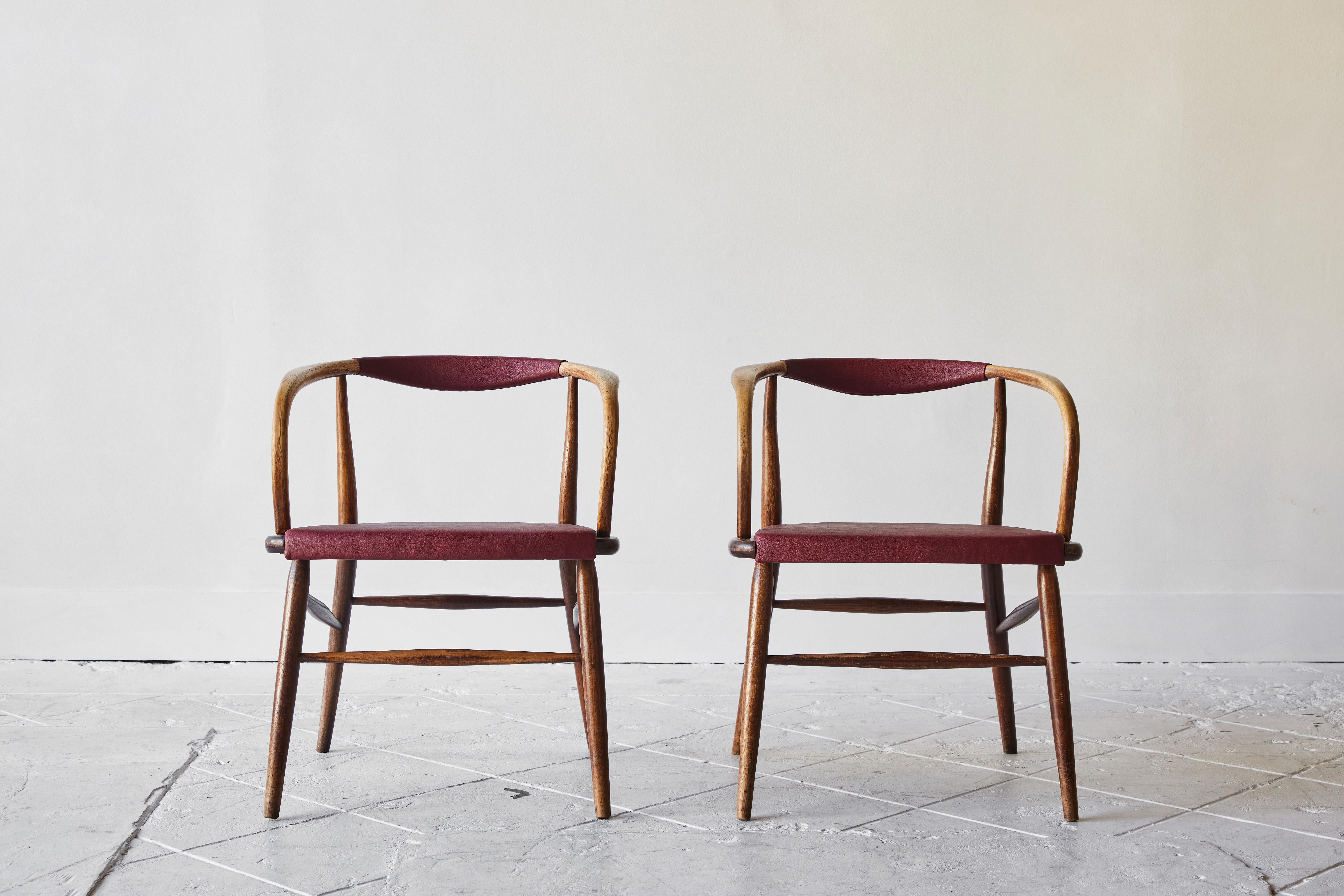This elegant bentwood Classic is a masterpiece in its construction and features a beautifully upholstered oxblood leather seat cushion and back rest. The design is attributed to Michael Thonet, an Austrian cabinet maker known for his invention of