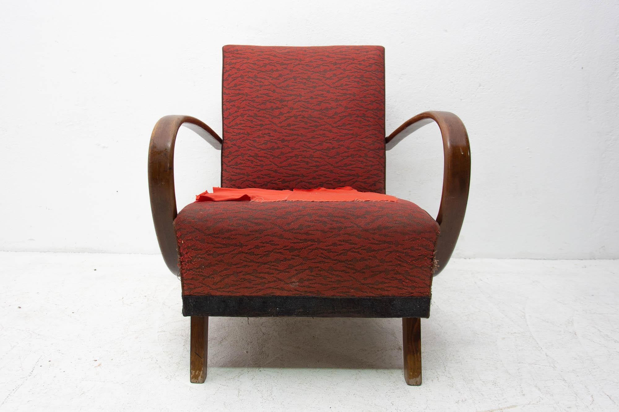 This bentwood armchair called “C” was designed by Jindrich Halabala and was made by UP Závody in the 1950s. The chair is stable and comfortable and in a good structurally condition.

In a few places, the fabric bears heavy marks of age in the form