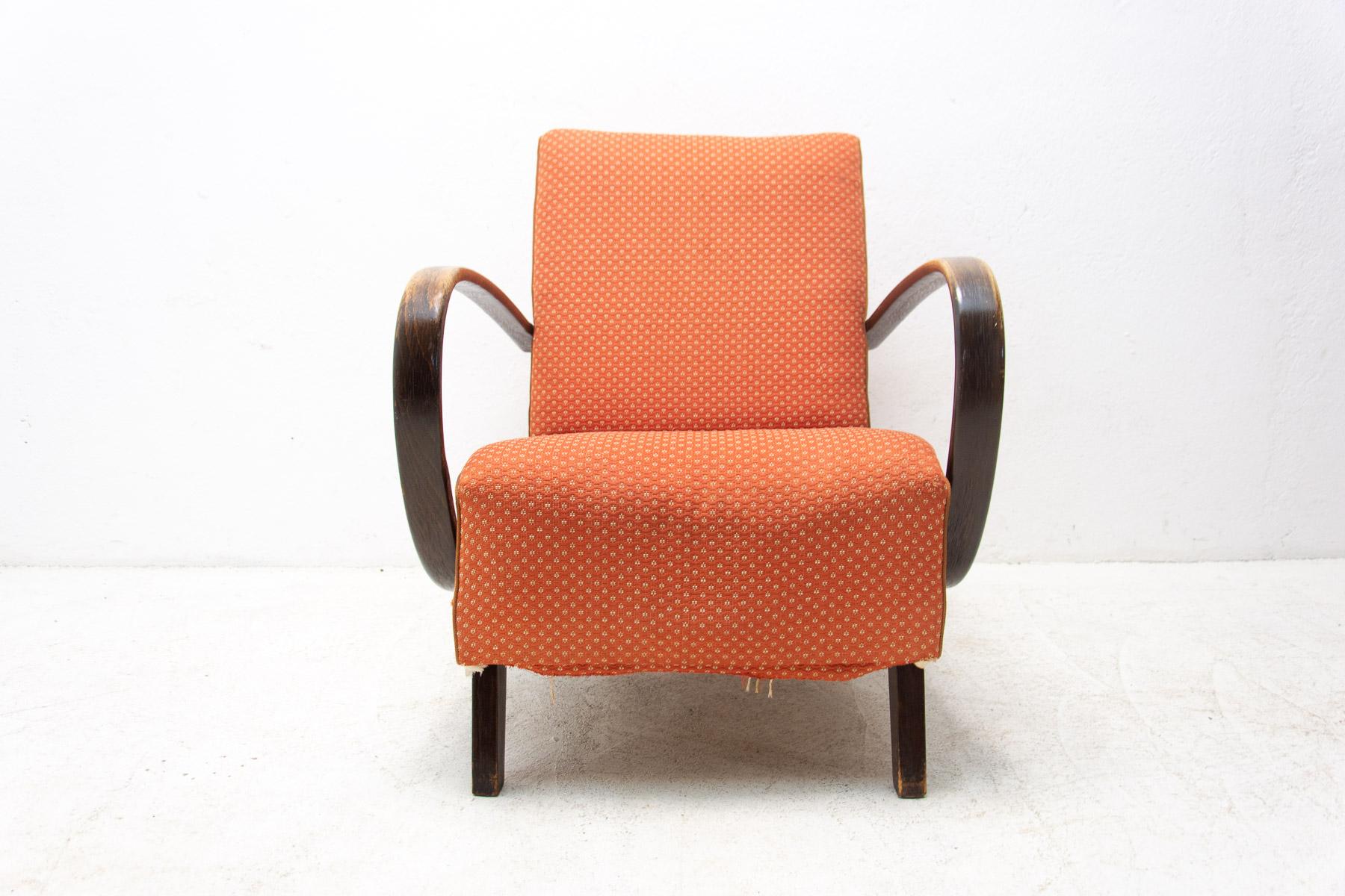This bentwood “C” armchair was designed by Jindrich Halabala and produced by UP Závody in the 1950´s. The chair is stable and comfortable and is in good structure condition. The fabric showing signs of age and wear. Look at the