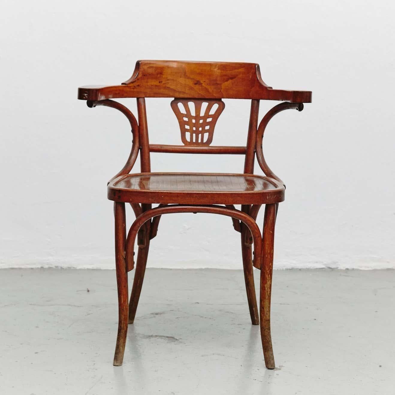 Bentwood armchair, made by unknown manufacturer.    In good original condition, preserving a beautiful patina, with minor wear consistent with age and use.
