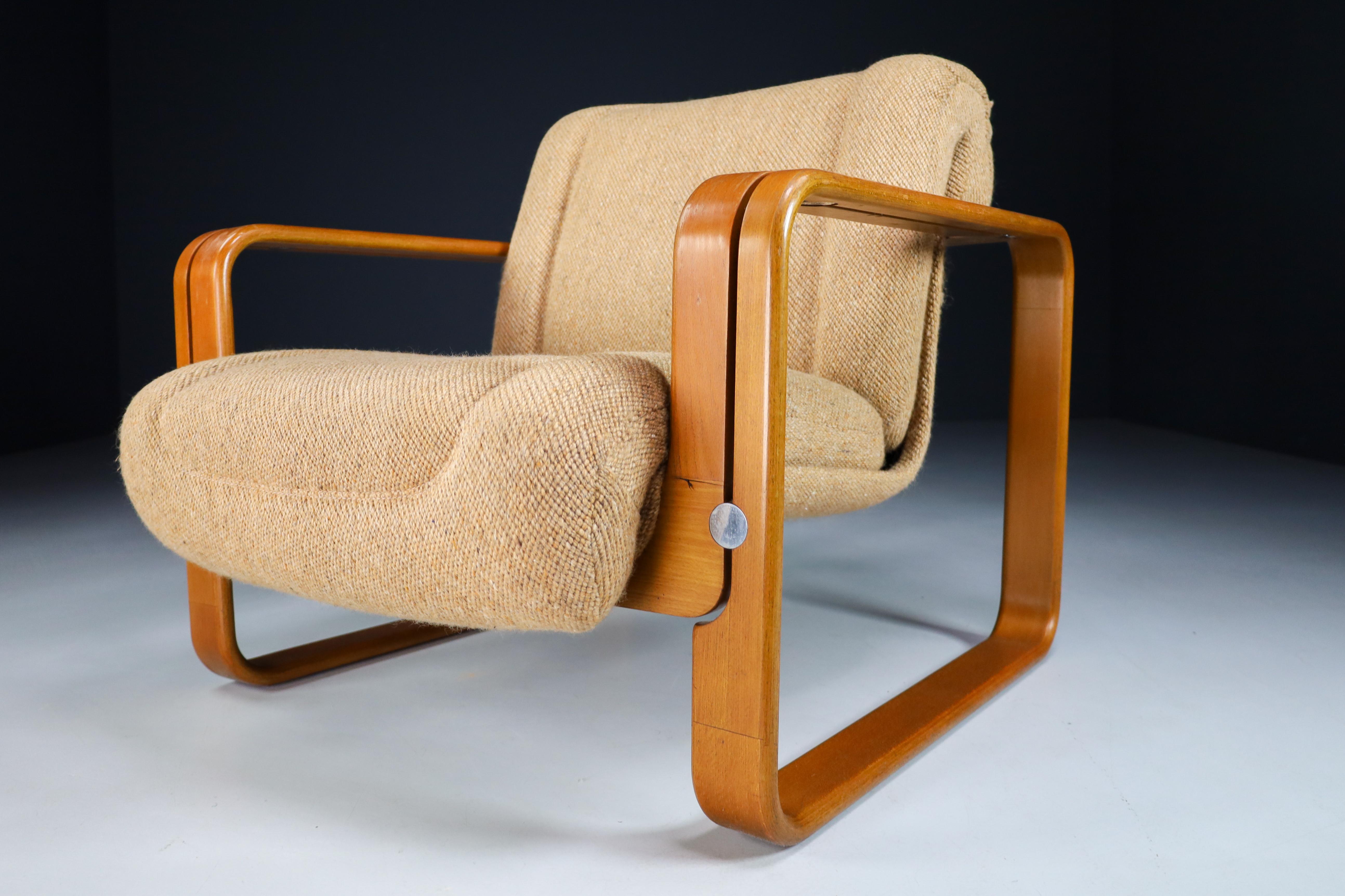 This armchair were designed by the award-winning architect Jan Bocan, possibly produced by Thonet or Ton. The armchair is in original good condition and has original 1970s upholstery and have nice bentwood frame with a very nice patina .The original