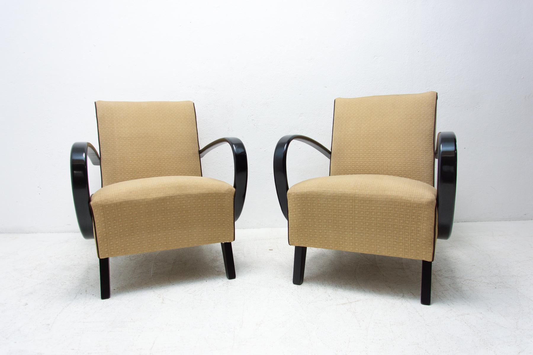 This pair of bentwood armchairs “C” was designed by Jindrich Halabala and were produced by UP Závody in the 1950´s. The chairs are stable and comfortable and in very good condition, the wood was lacquered black in the past. Price is for the