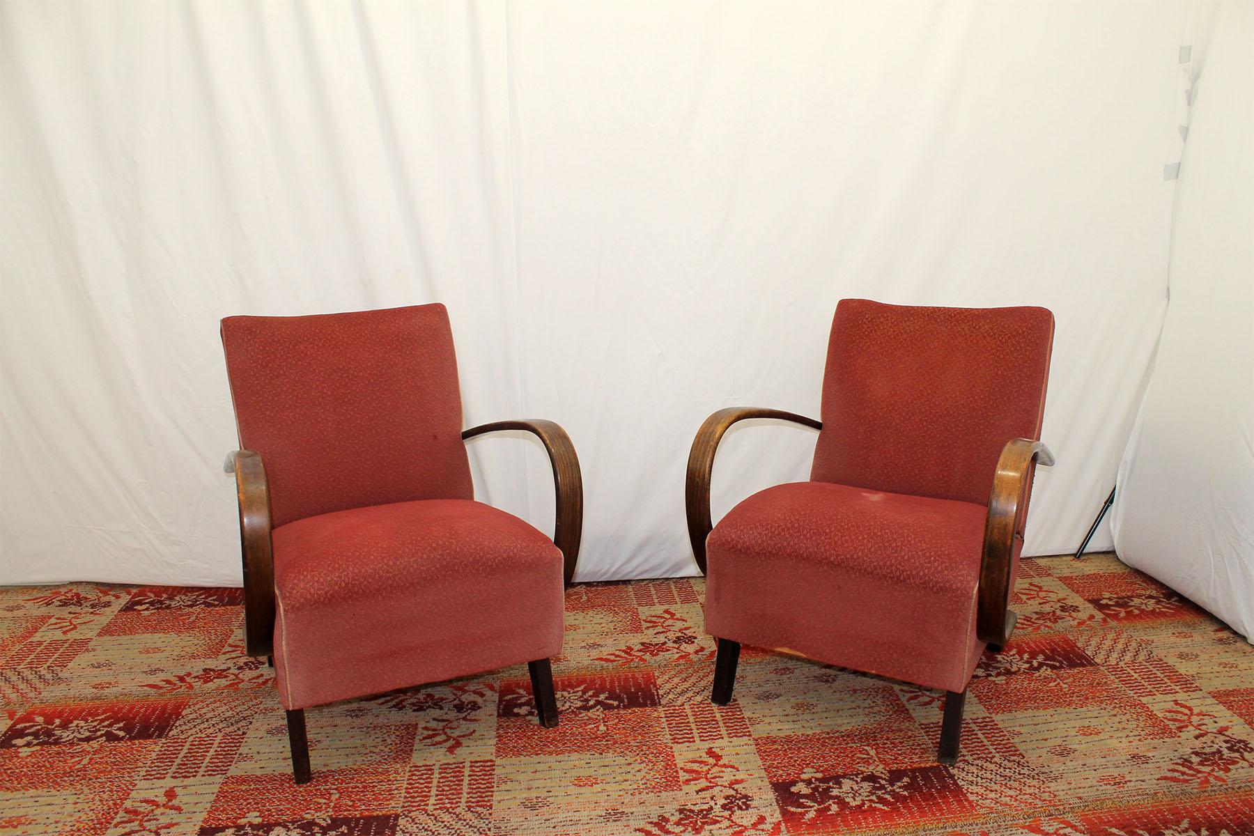 This pair of bentwood “C” armchairs was designed by Jindrich Halabala and were produced by UP Závody in the 1950´s. The chairs are stable and comfortable, the armrests are in good Vintage condition, the fabric shows signs of age and using and is