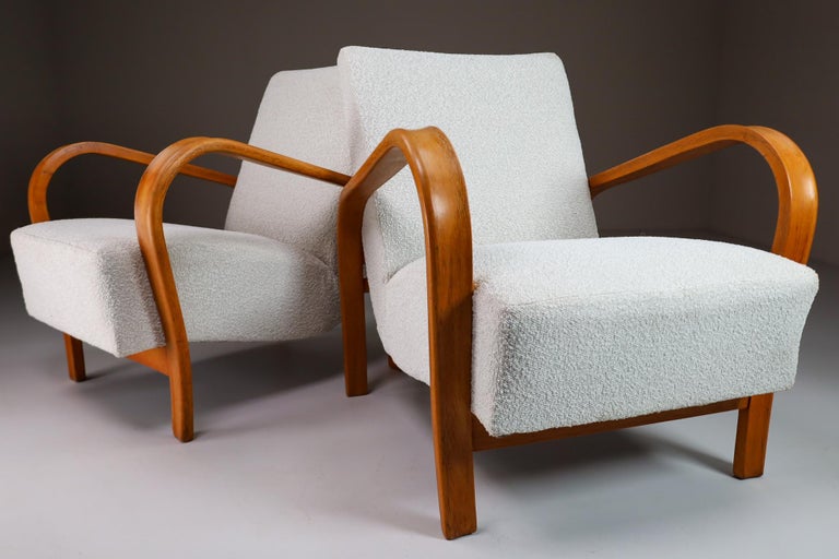 These iconic set chairs from Czechia, circa 1940 designed by By Karel Koželka & Antonín Kropá, are a benchmark for midcentury design in Central Europe. A simple and elegant geometry contrasts the soft and comfortable seat with dynamic bentwood