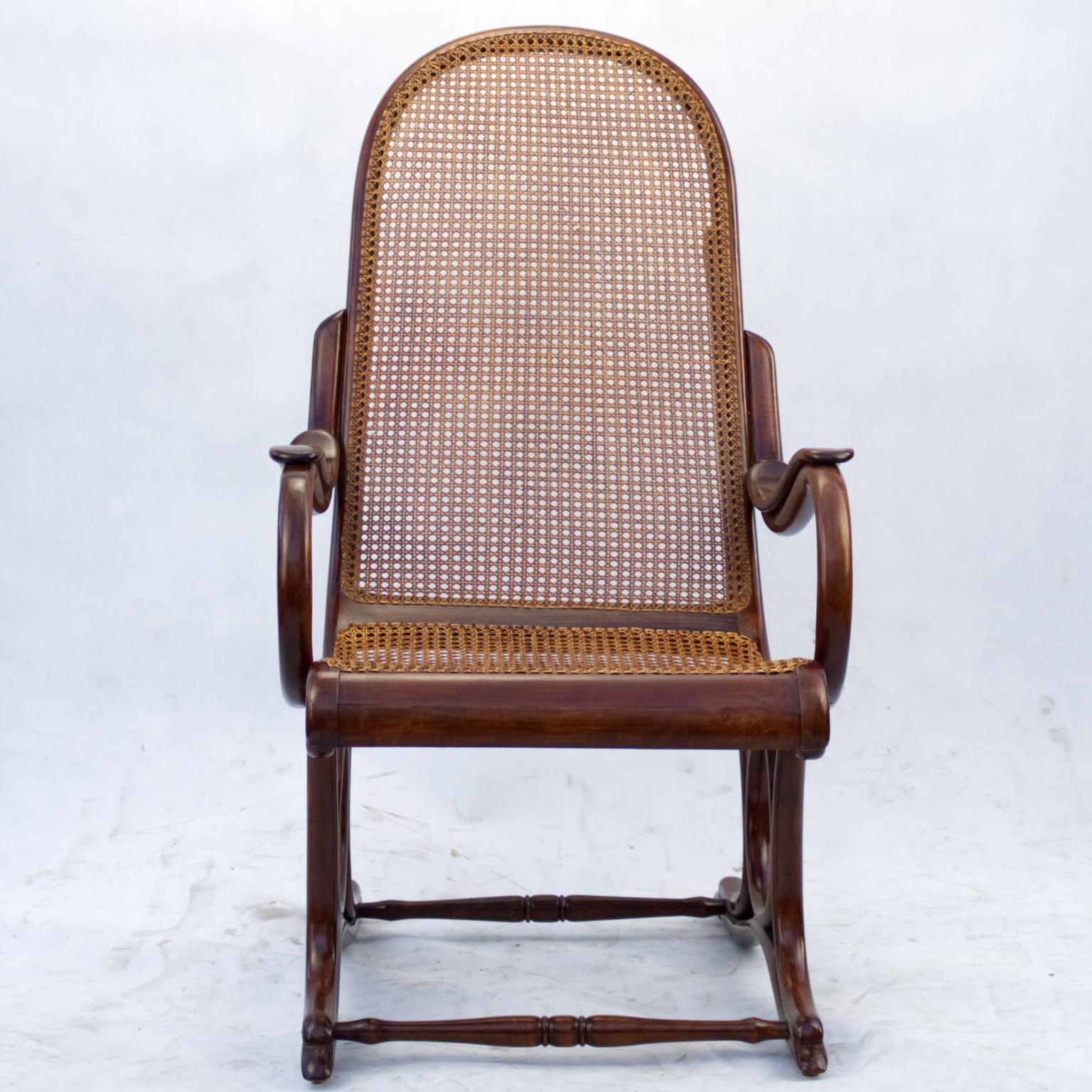 Very rare antique Thonet easy chair no 1 produced by Gebruder Thonet from the late 19th century in a very good condition with new cane on seat, cane on backrest is most likely original, but in 100% condition. Wood parts are in French polish.
There