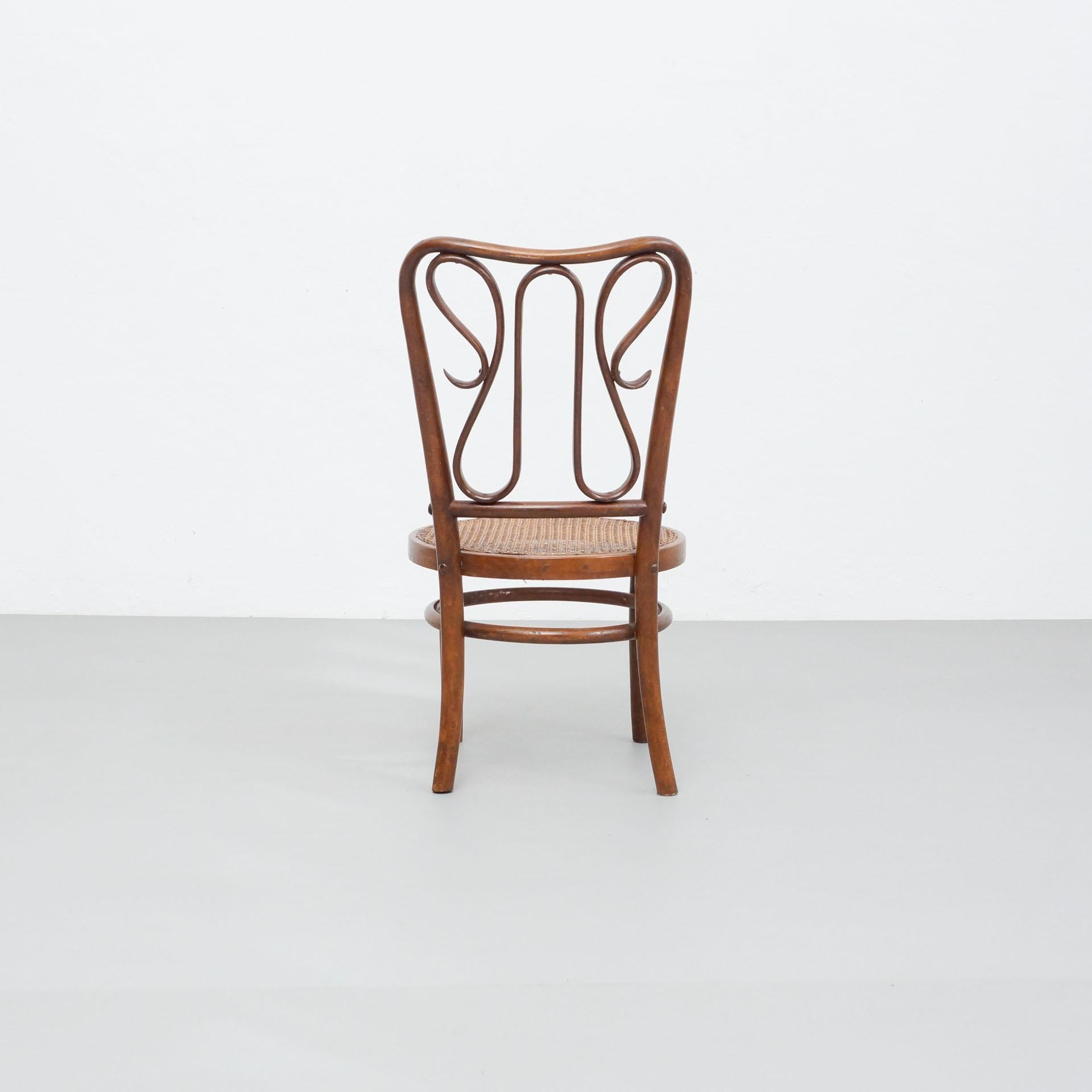 Mid-20th Century Bentwood Chair in the Style of Thonet, Rattan and Wood, circa 1940 For Sale