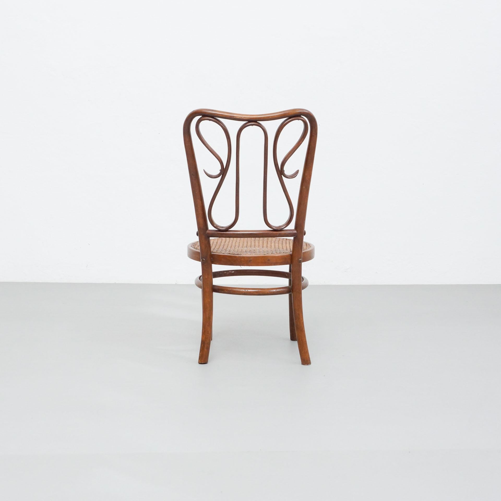Mid-Century Modern Bentwood Chair in the Style of Thonet, Rattan and Wood, circa 1940 For Sale