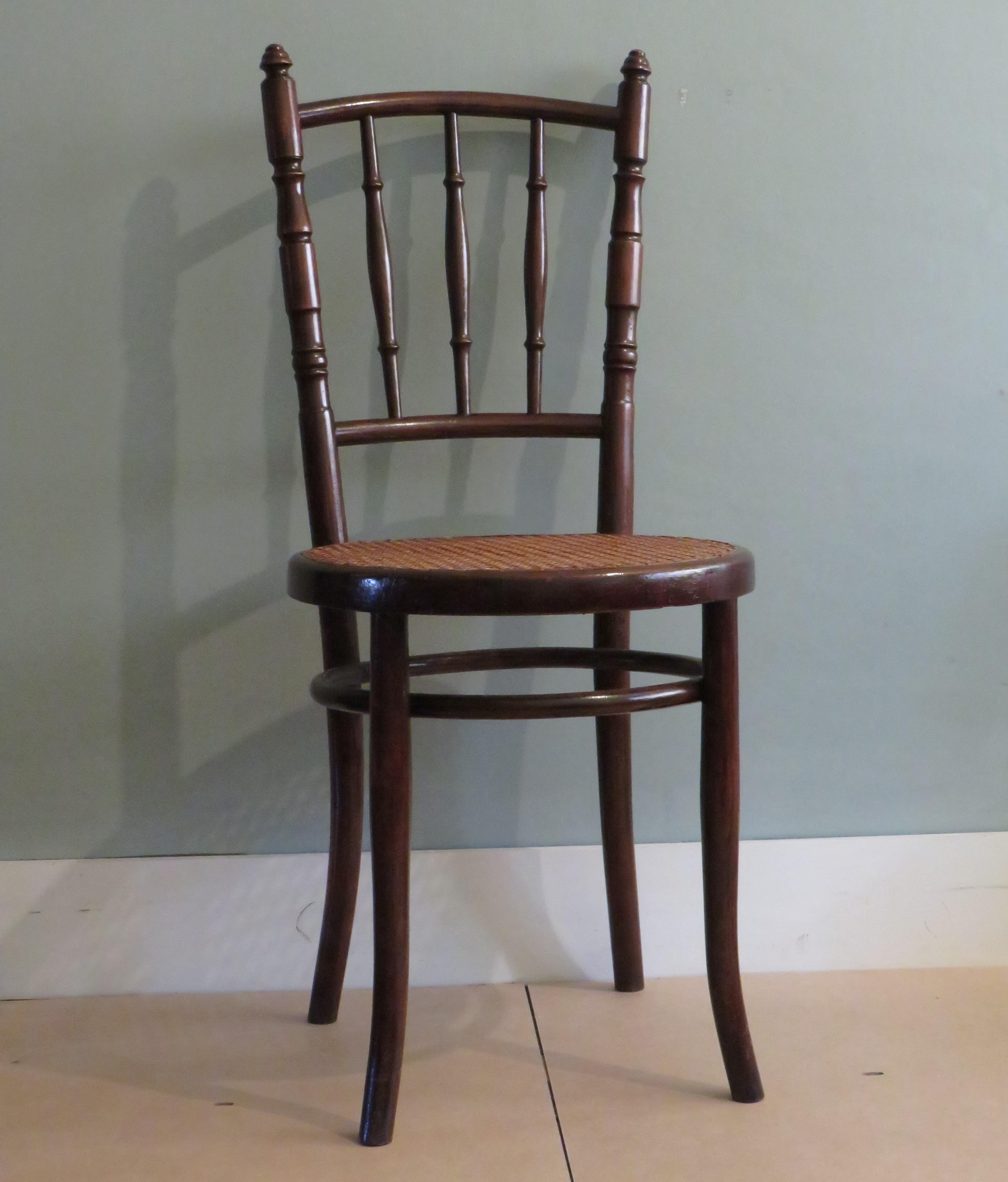 Bentwood chair by Mundus, early 20th century Austria
Manufactured by Mundus under license of Thonet.
This bentwood chair has a hand-woven webbing seat and is in very good condition.
There is a factory stamp present.
Dimensions: H 93, W 41 and D
