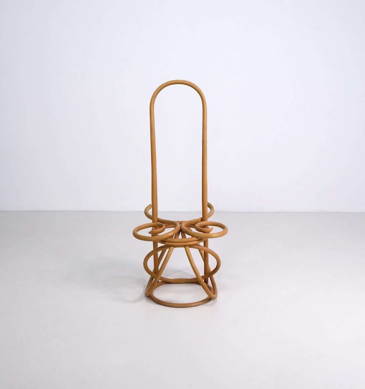 Sculptural bentwood 'Chair of the Rings' chair designed by Martin Gamper and produced by Thonet in 2008. 

Gamper was invited by Polly Dickens, creative director of the Conran Shop, to reinterpret the classic Thonet bentwood chair for the retailers