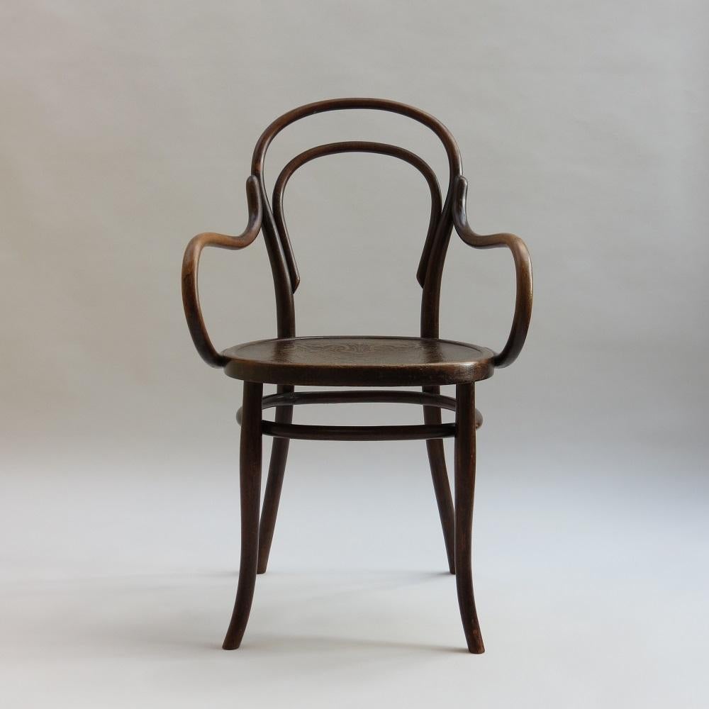 Wonderful bentwood chair, produced by Thonet, this design originally dates from 1859. Made from bent solid and laminated Beech construction with moulded plywood seat.
This chair dates from the early 1890s.  Model Number 14
Retains the original