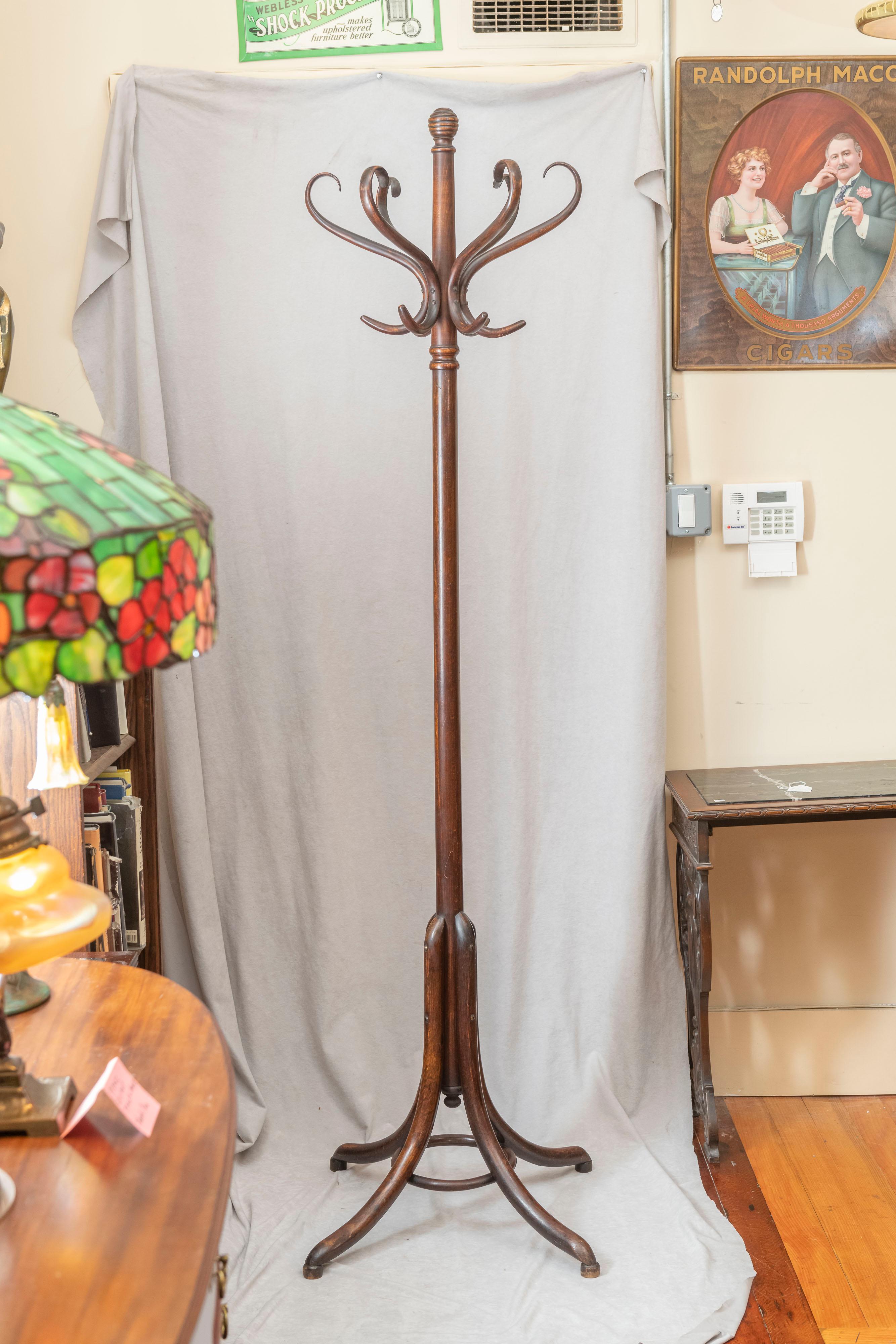 We took the liberty to call these pendants a pair. The glass is the exact same, but the hardware is slightly different. They look so great together, and we never get pairs of these. We had one, and we found another. The poles are just a tad bit