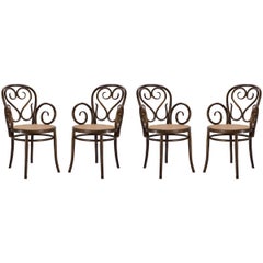 Bentwood Dining Armchairs with Caned Seats by Salvatore Leone, Set of Four