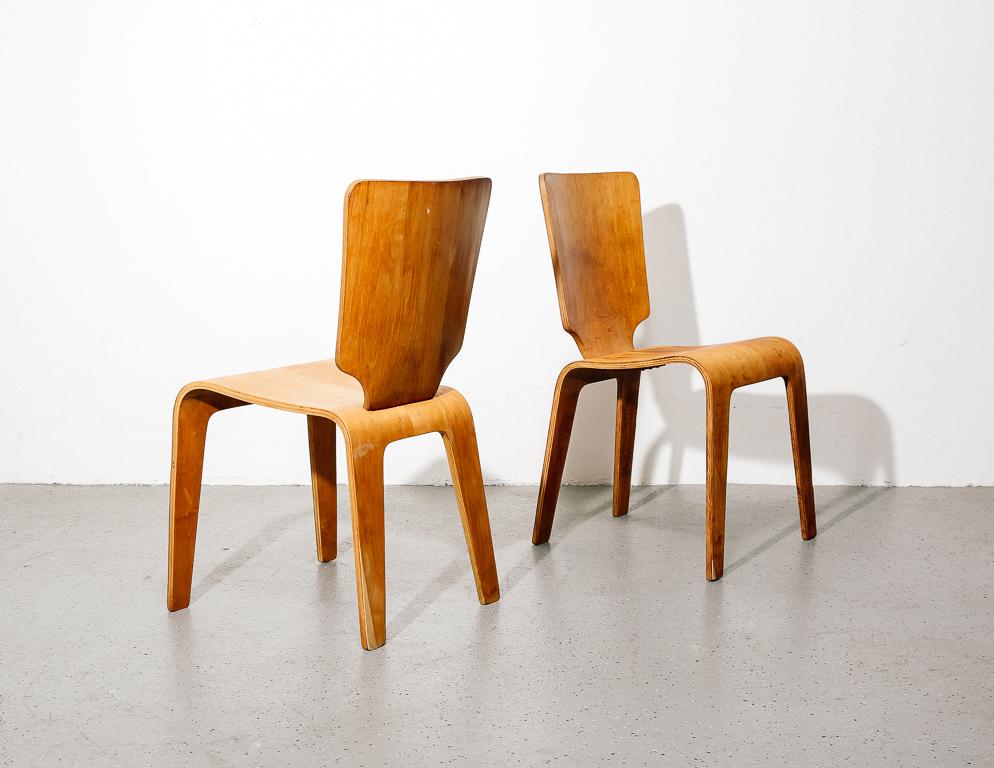 Pair of bent plywood dining chairs by Thaden Jordan, 1940s. Contemporary of the bent plywood Eames designs of the time, these chairs by Thaden Jordan epitomize post-war technology and design.