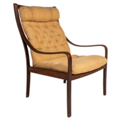 Sillón de madera curvada, palisandro, Fredrik A. Kayser, Vatne Møbler, Dinamarca, década de 1970