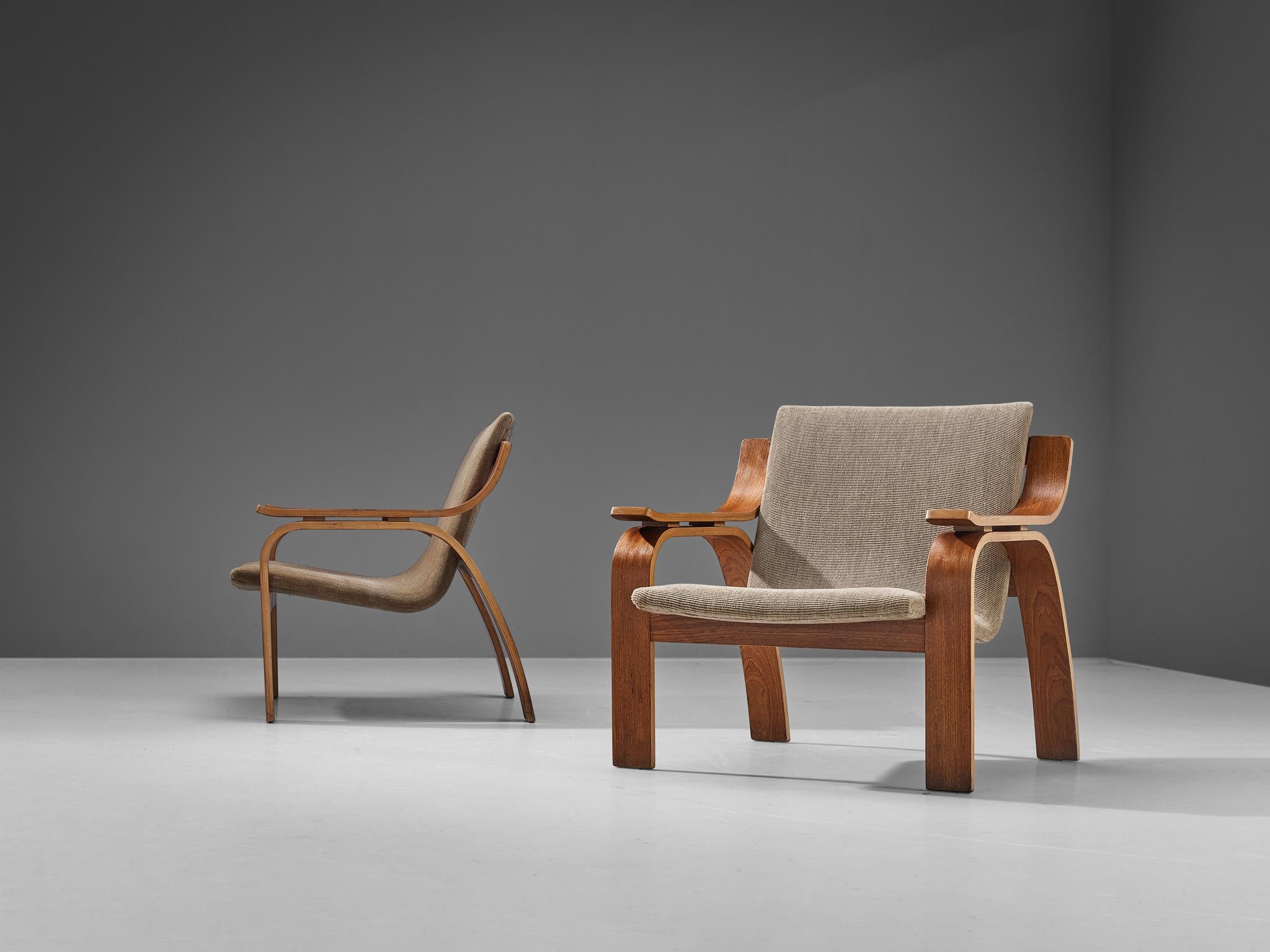 Pair of lounge chairs, bentwood mahogany, fabric, Czech Republic, 1970s

This charming pair of lounge chairs shows a splendid construction that epitomizes a simplistic, natural, and timeless aesthetics. The frame of the chair is well-designed