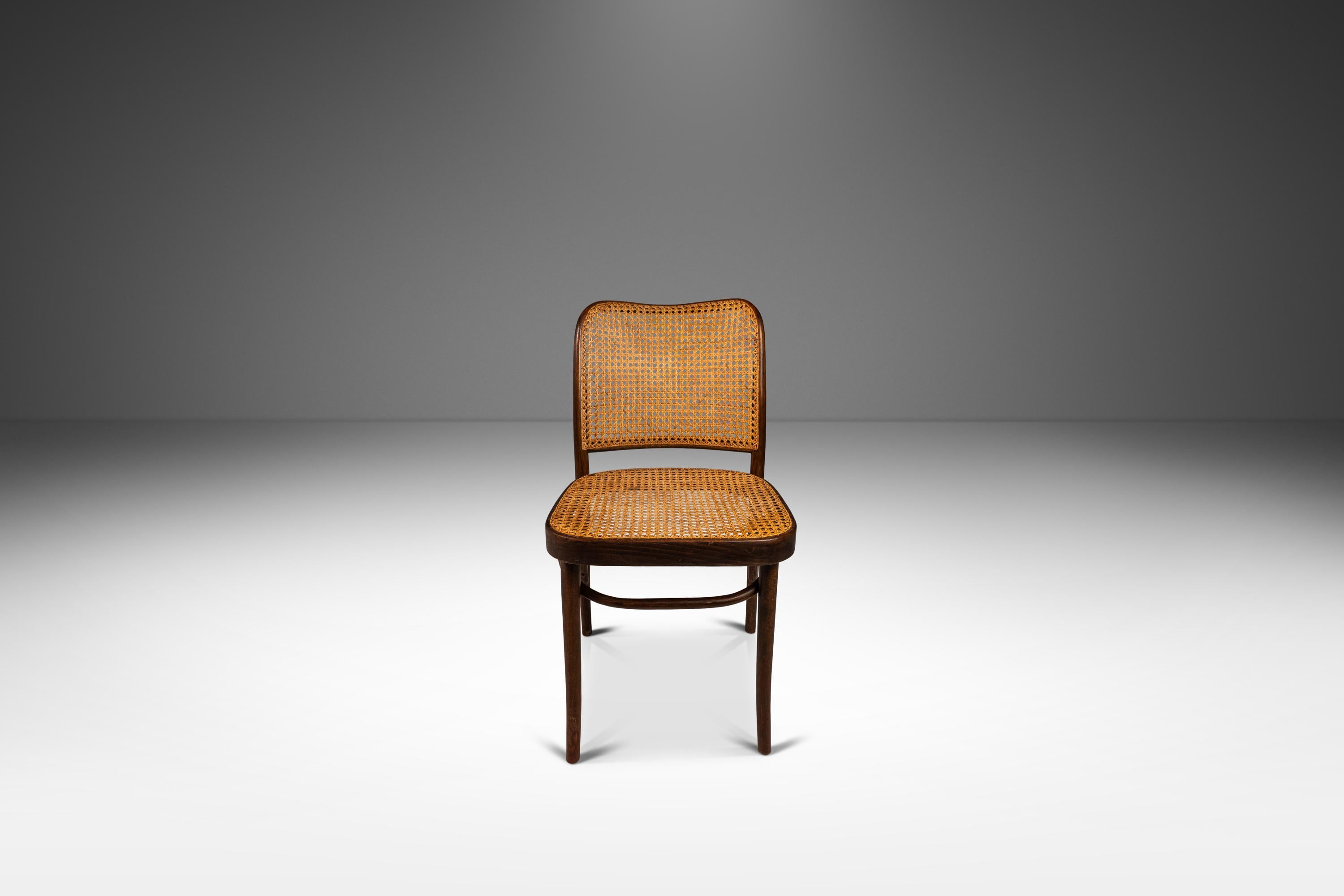 Introducing a rare and beautiful single bentwood Prague Model 811 side chair by the renowned designers Josef Frank and Josef Hoffmann for Stendig. Designed in the 1960s, this chair is a true representation of mid-century modern design and