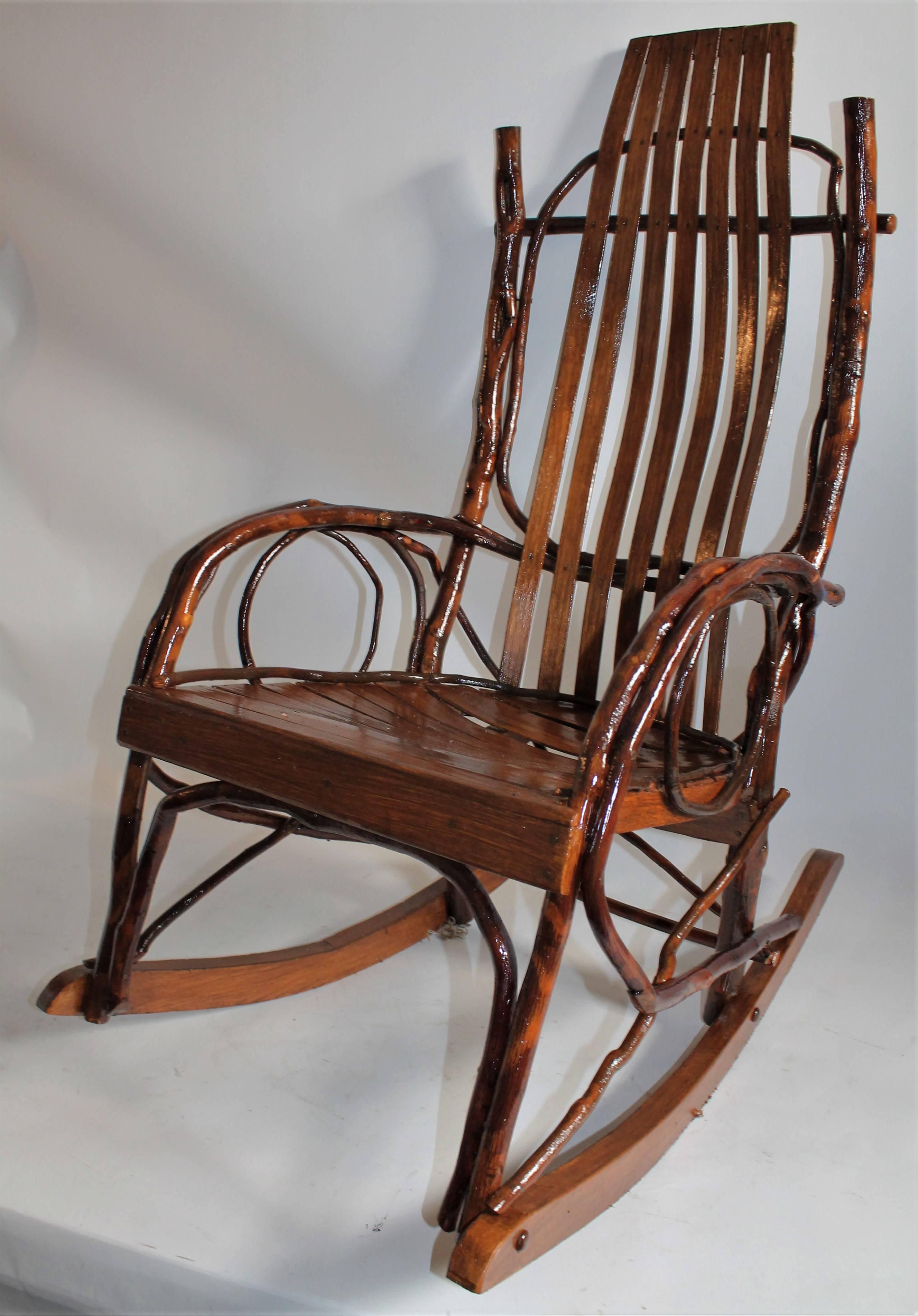 This bentwood rustic Amish rocking chair is from Ohio and is in very good condition. It is from the 1940s with cabin look. It is super comfortable.
 