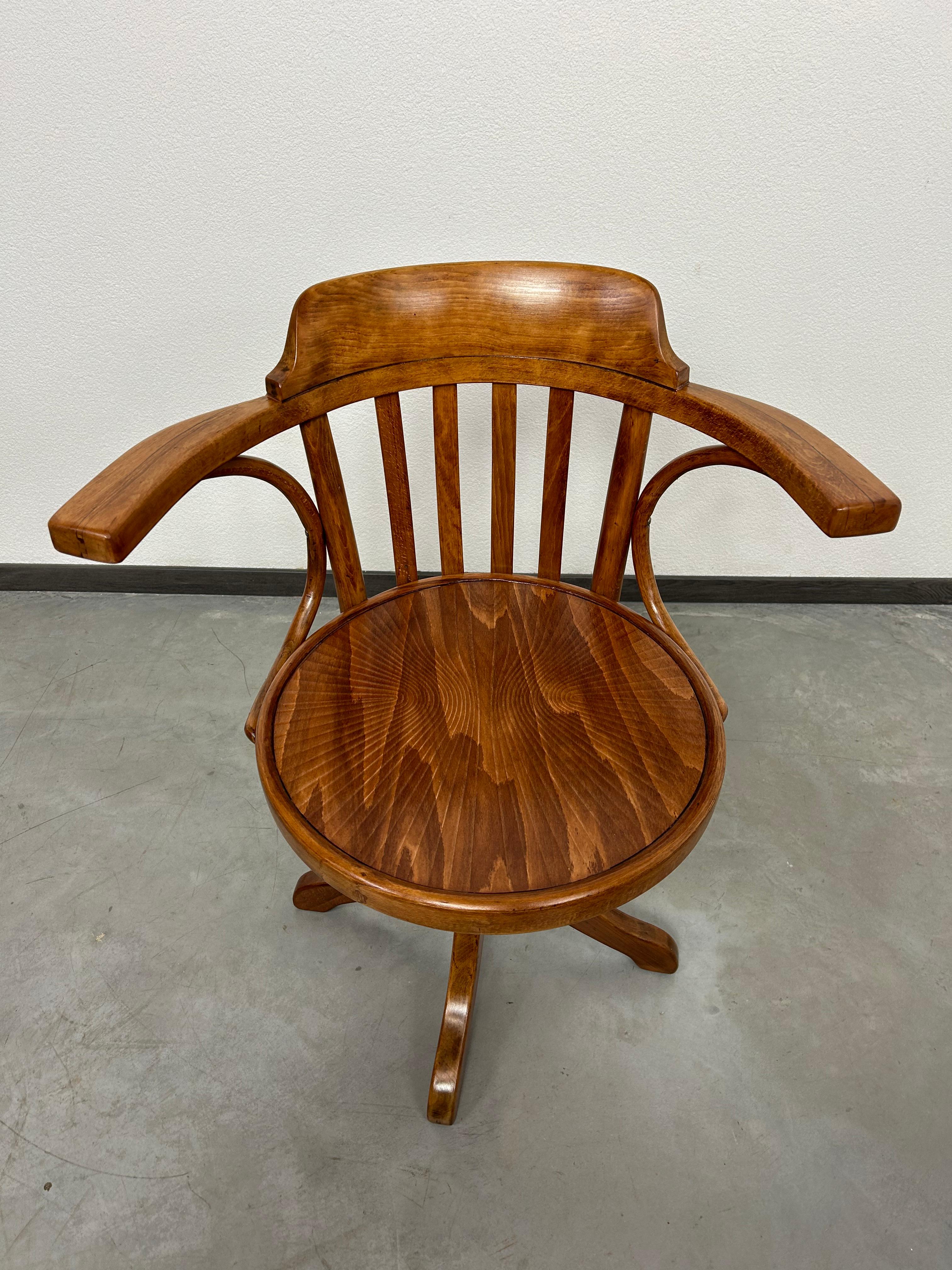 Bentwood swivel chair B663 by Thonet. Professionally stained and repolished.