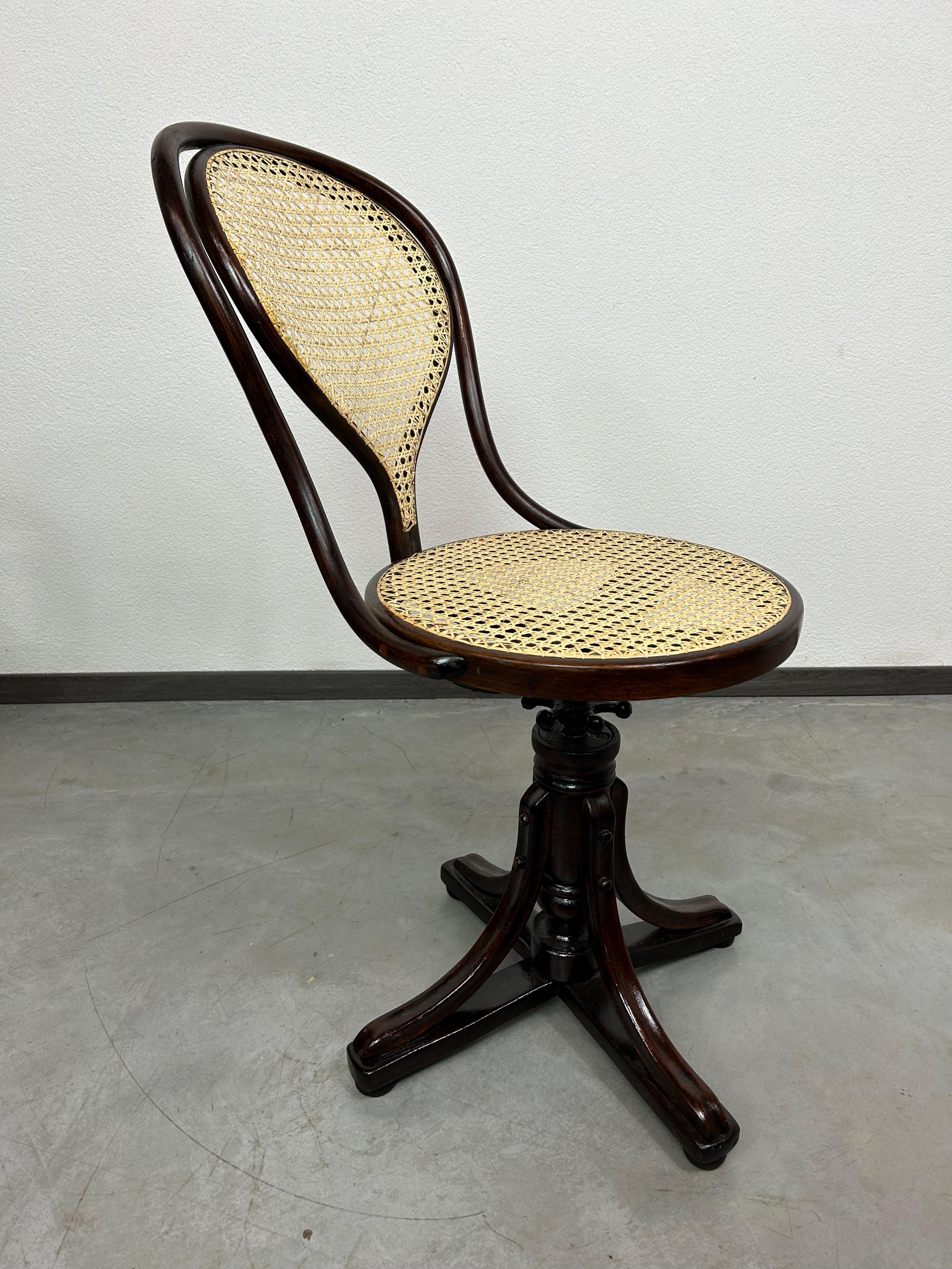 Bentwood swivel chair no.9 by J.J.Kohn new handmade rattan seat.
