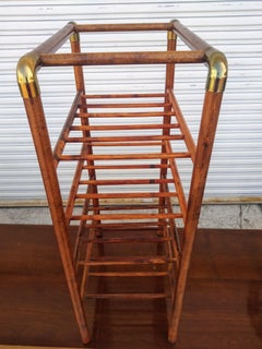 Bentwood wine rack with brass accents