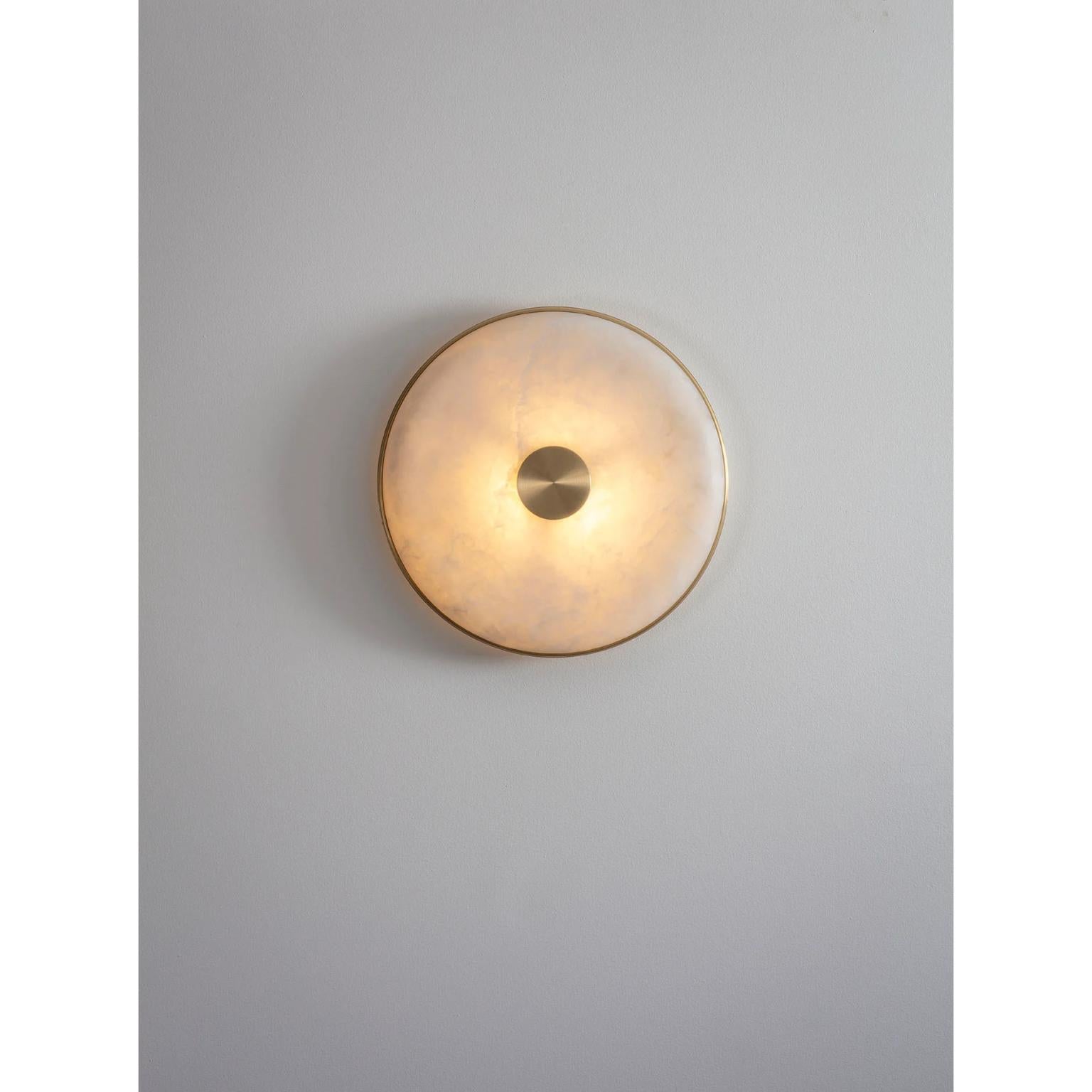Beran Brushed Brass Large Wall Light by Bert Frank
Dimensions: D 6,5 x W 36 x H 36 cm.
Materials: Brass and alabaster.

Available in two different sizes. Available in different finishes and materials. Please contact us. 

Simple and elegant in form,