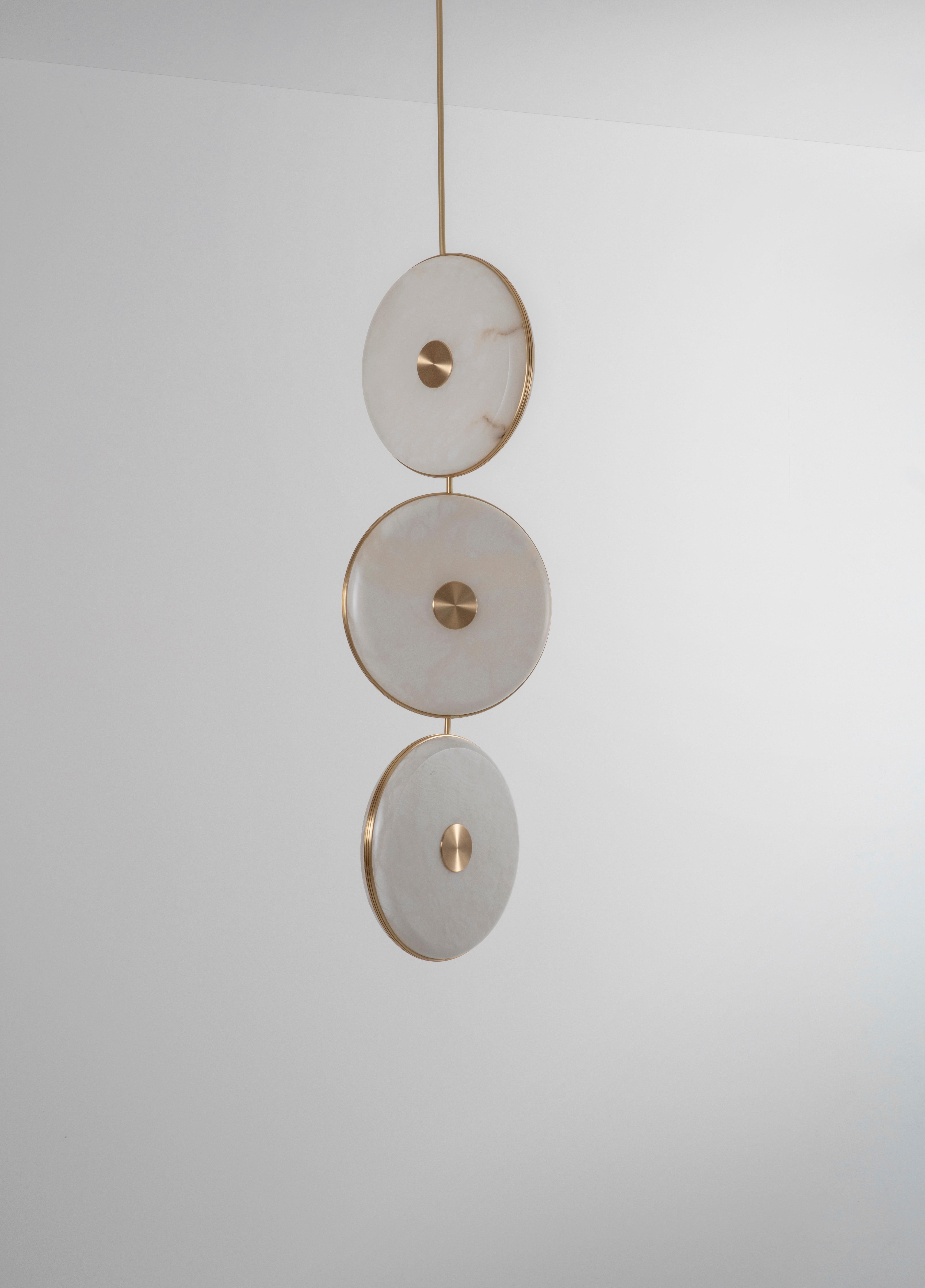 Beran Brushed Brass Small Drop 3 Chandelier by Bert Frank
Dimensions: Ø 26 x H 100 cm. 
Materials: Brass and alabaster.

Available in two different sizes. Available in different finishes and materials: Brushed brass, Antique brass, Dark bronze and
