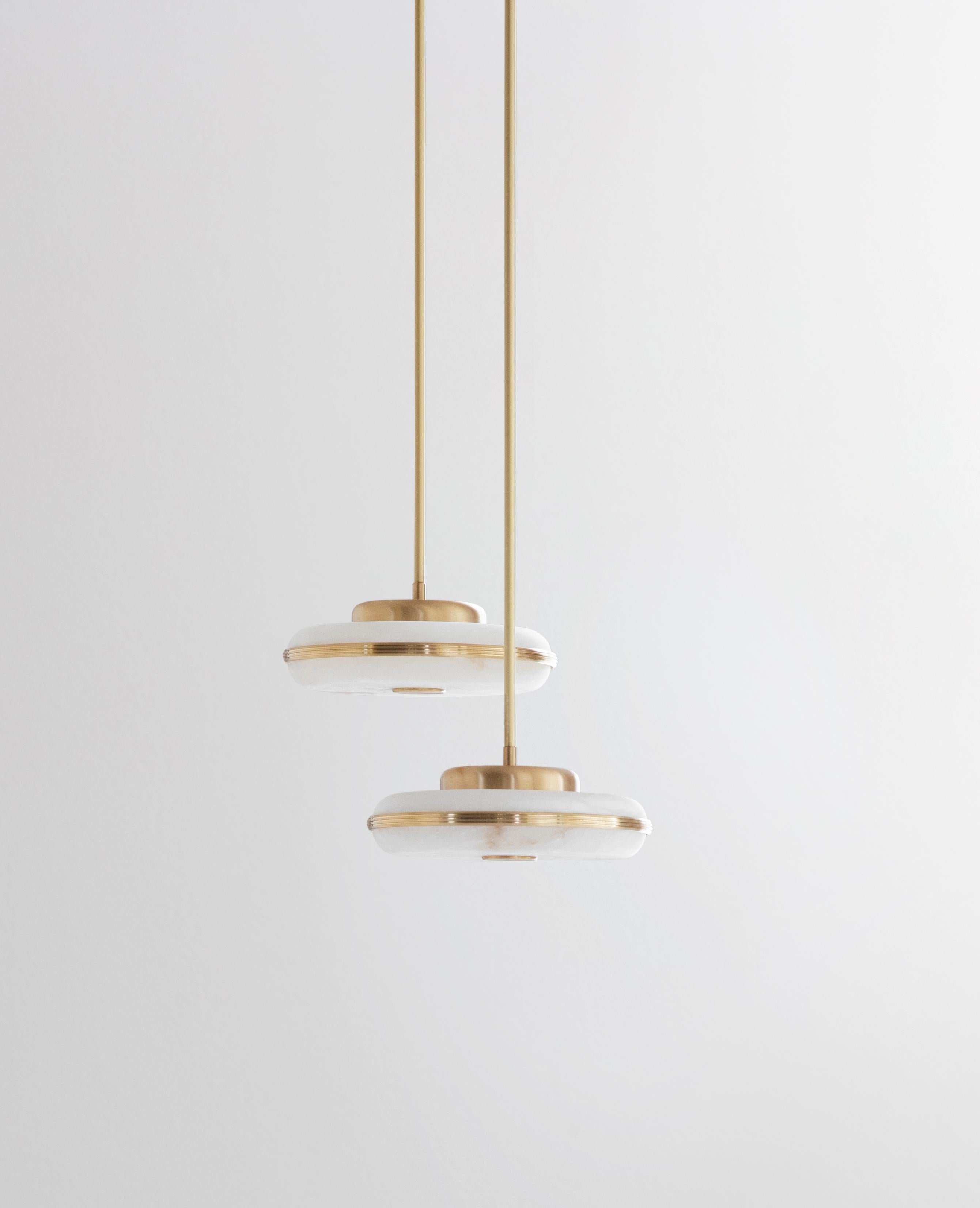 Beran Brushed Brass Small Pendant Lamp by Bert Frank
Dimensions: Ø 26 x H 6 cm. 
Materials: Brass and alabaster.

Available in two different sizes. Available in different finishes and materials. Height is customized to order. Please contact us.