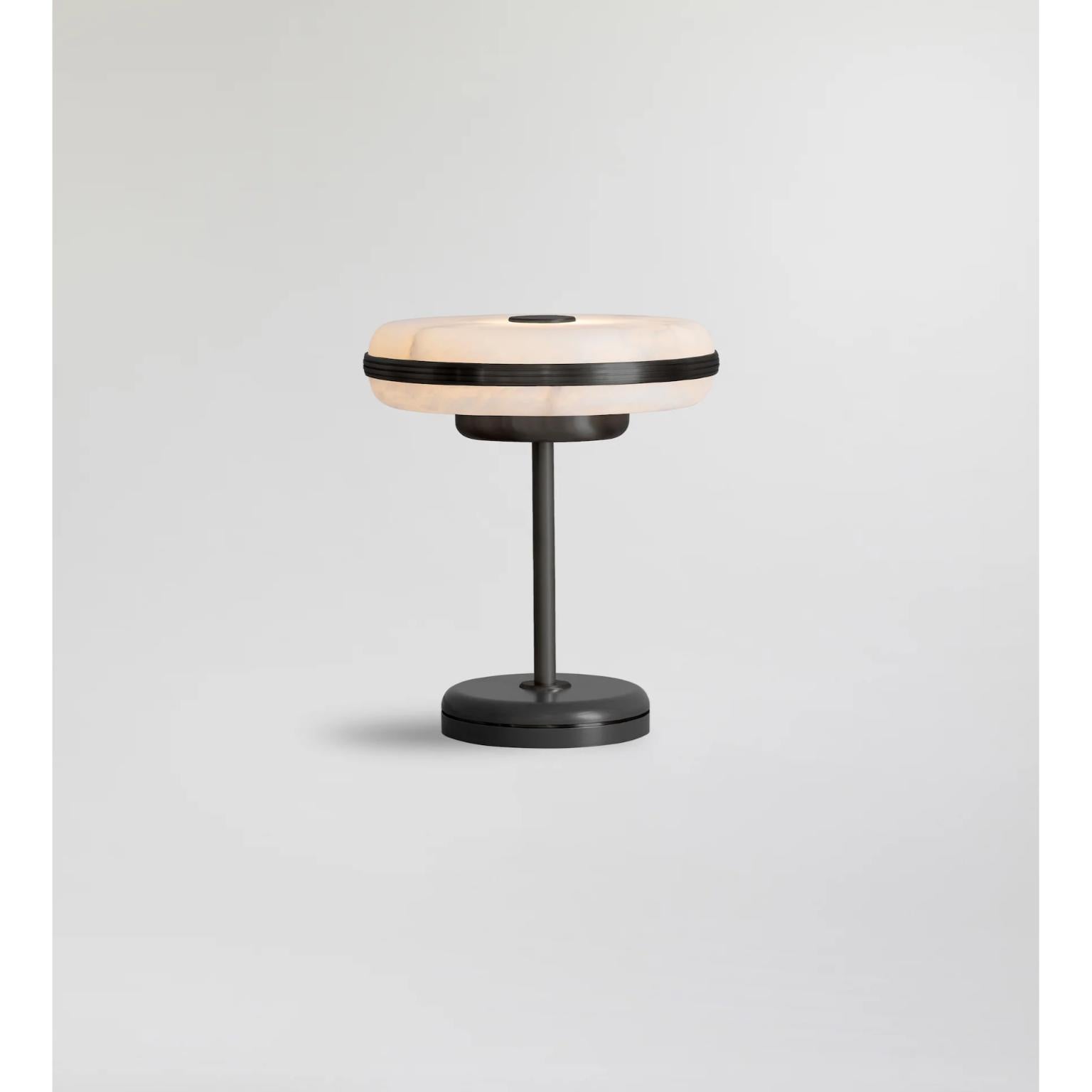 Beran Dark Bronze Small Table Lamp by Bert Frank
Dimensions: Ø 26 x H 28 cm.
Materials: Bronze and alabaster.
Base finish: Satin black.

Available in two different sizes. Available in different finishes and materials. Please contact us. 

The