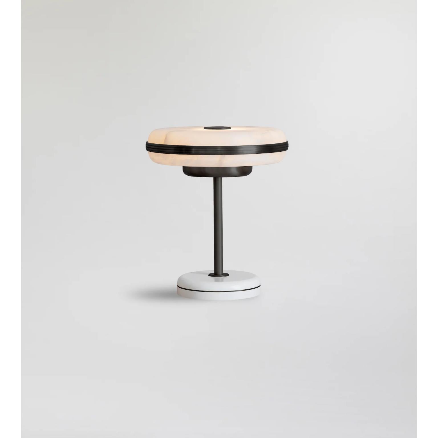 Beran Dark Bronze Small Table Lamp by Bert Frank
Dimensions: Ø 26 x H 28 cm.
Materials: Bronze and alabaster.
Base finish: Satin white.

Available in two different sizes. Available in different finishes and materials. Please contact us. 

The