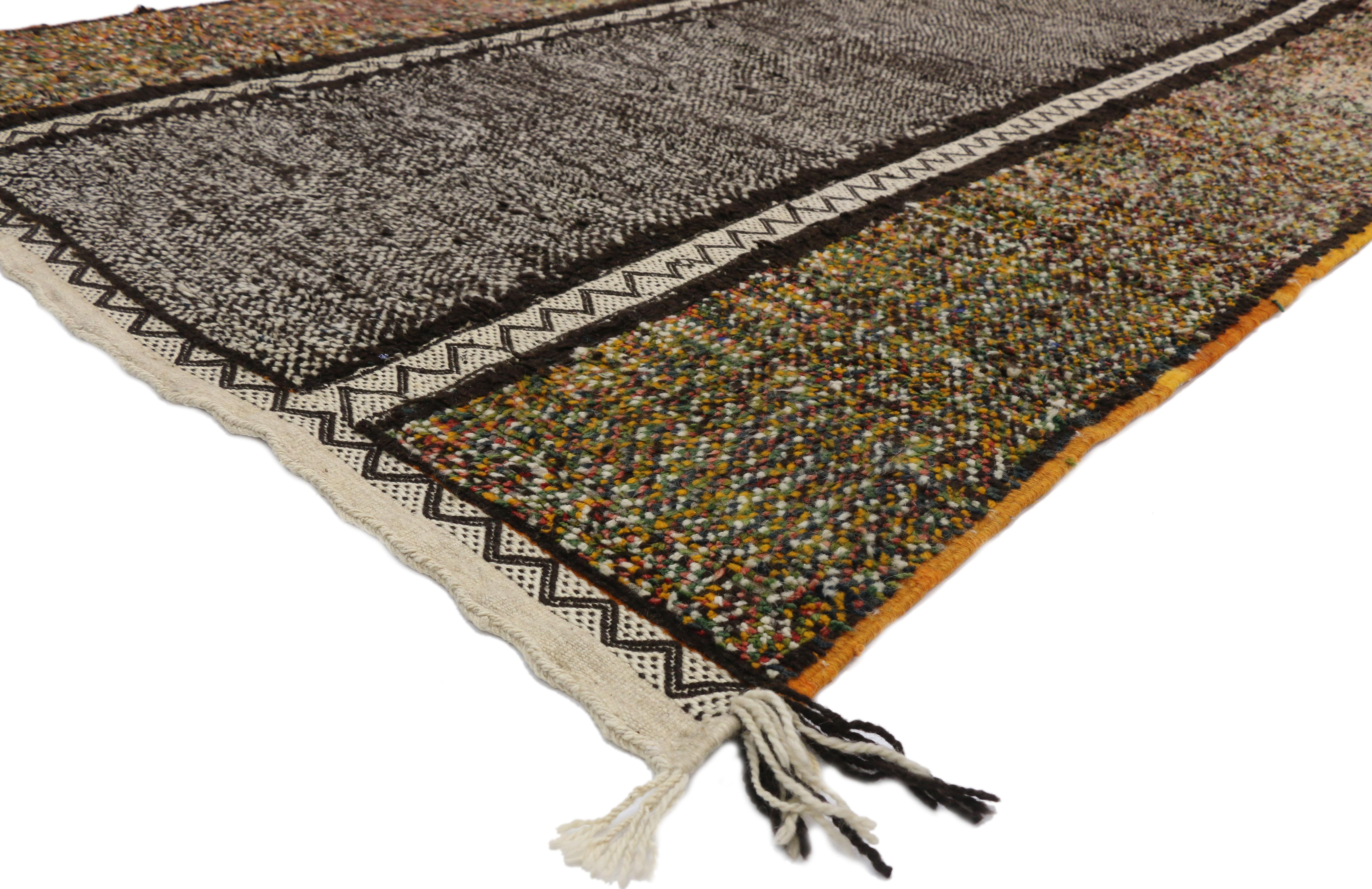 20887 Vintage Berber Moroccan rug with Modern Tribal style. This hand knotted wool vintage Berber Moroccan features three columns separated by zigzag Kilim bands. The middle column displays black-coffee (espresso) and ivory confetti sprinkles