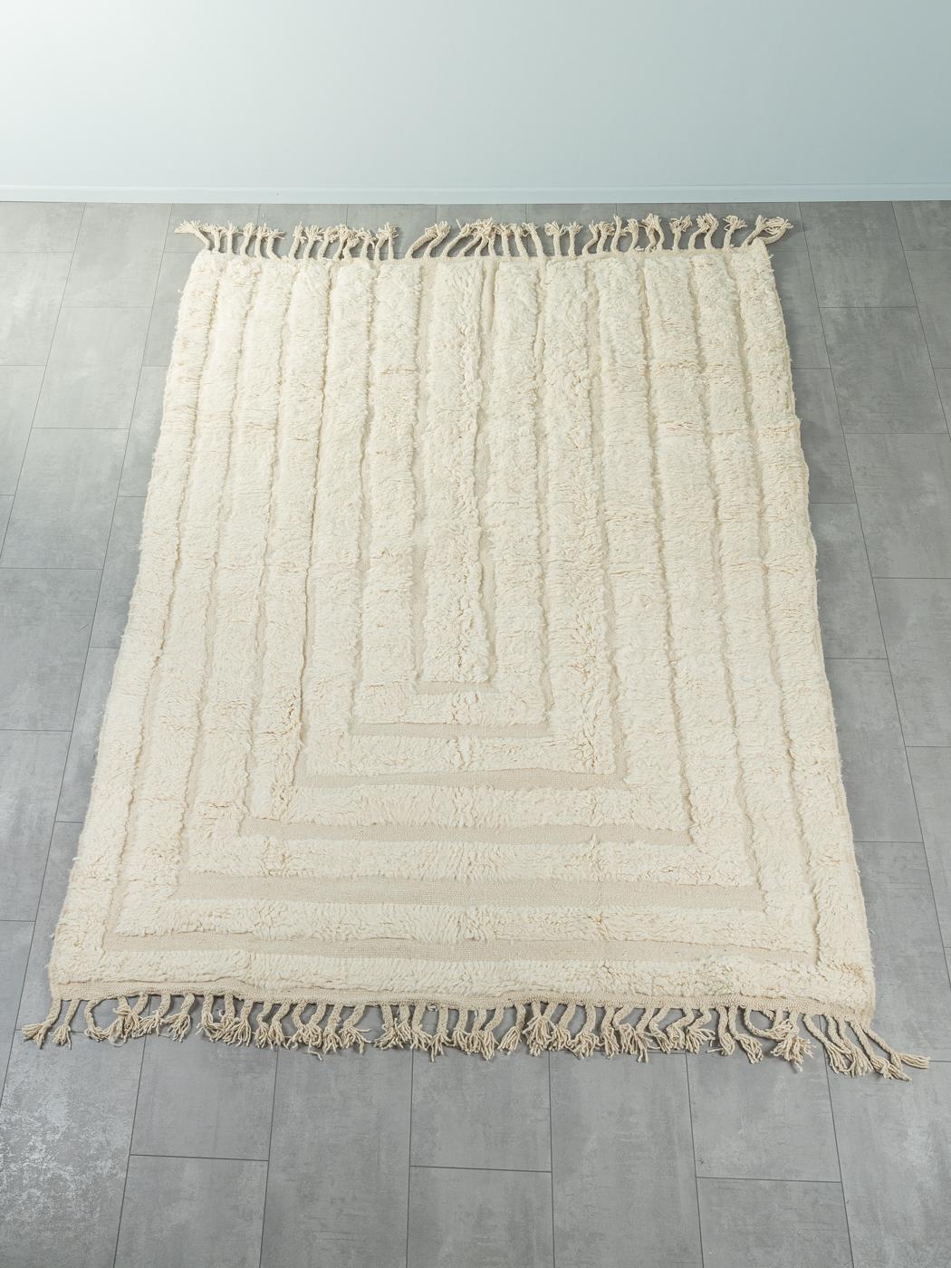 Mountains is a contemporary 100% wool rug – thick and soft, comfortable underfoot. Our Berber rugs are handwoven and handknotted by Amazigh women in the Atlas Mountains. These communities have been crafting rugs for thousands of years. One knot at a