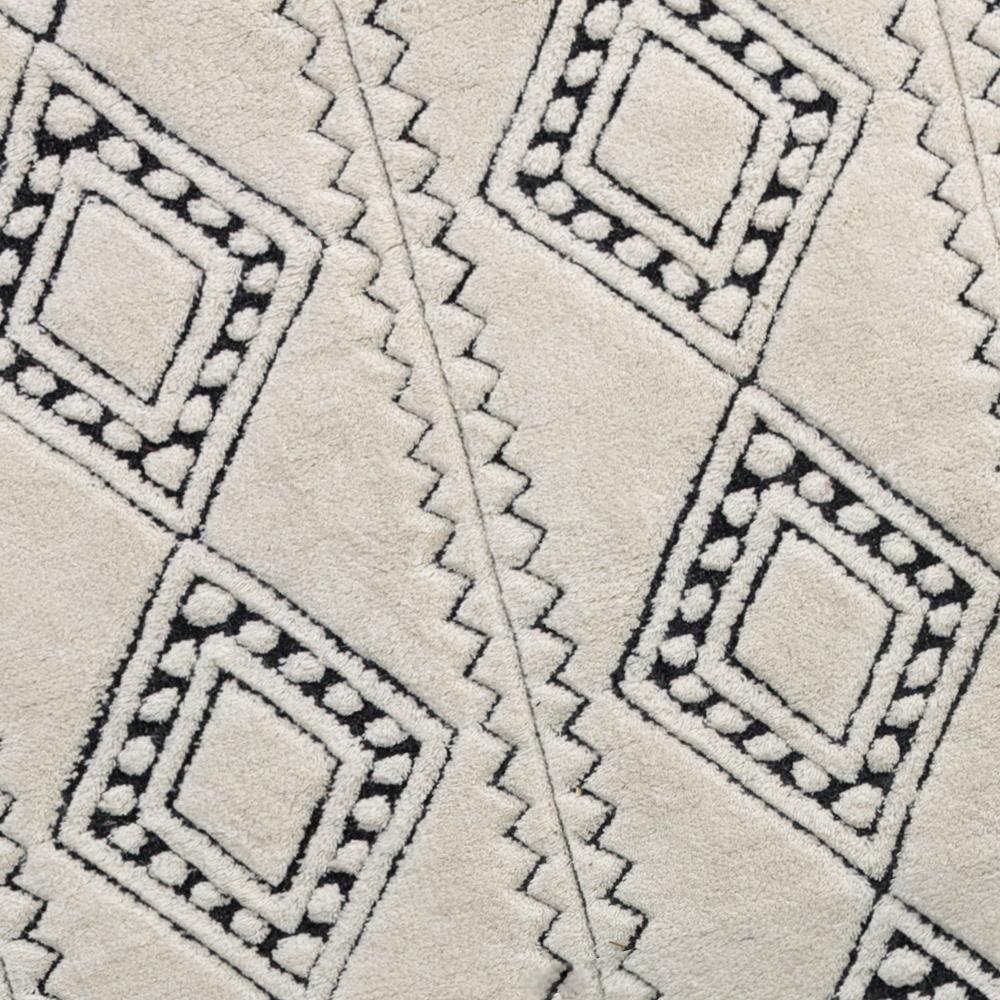 The Honeycomb rug is a modern geometric take on Berber styled vintage pieces. Its super soft, rich weaved wool pattern reflects a love of global style, for the traveler within. This precisely handwoven pattern is available in both the striking cream
