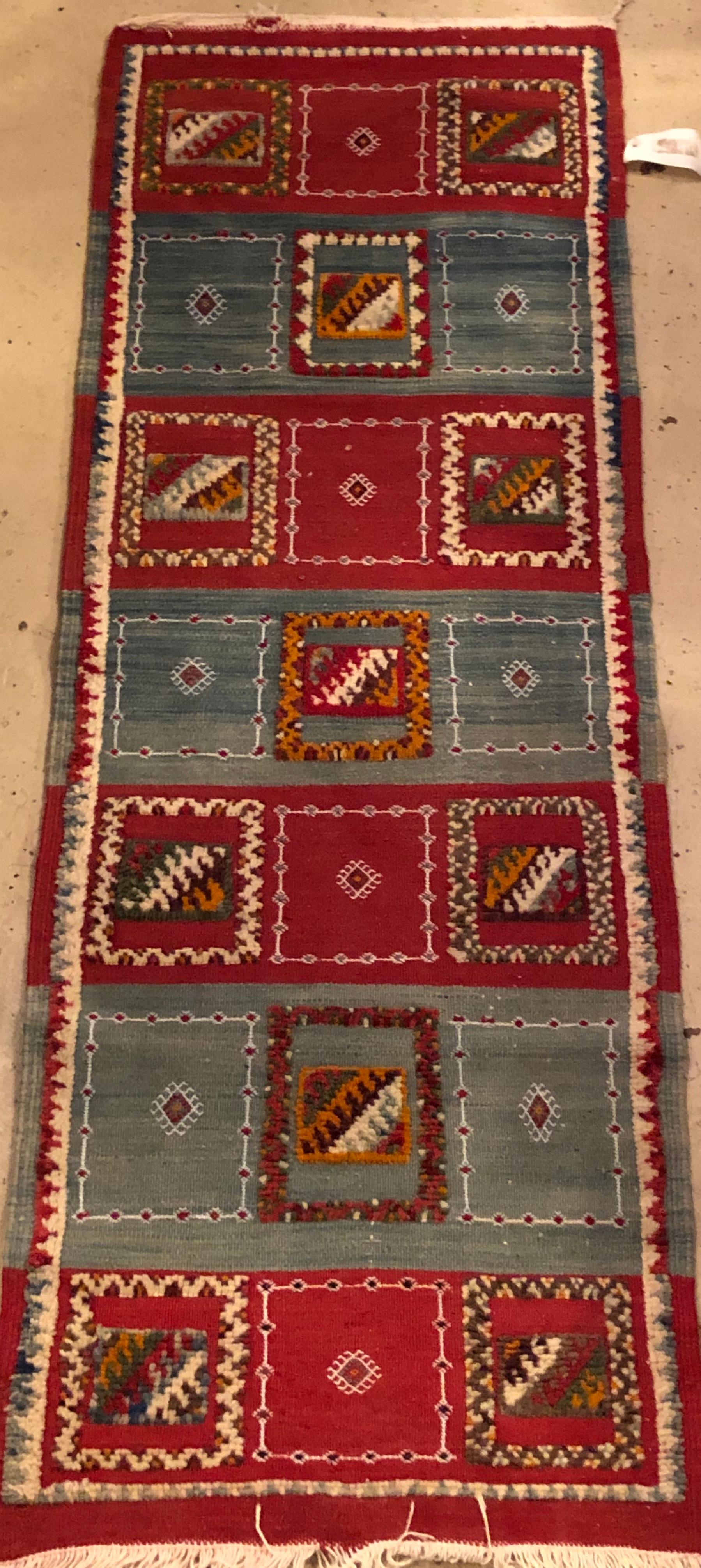 Tribal Moroccan runner-blue, red geometric patterns handwoven organic rug
An elegant and ennobling addition to hallways, foyers, entryways, dressing rooms, staircases and wherever else a slender rug is desired. This rug is handwoven rug from the