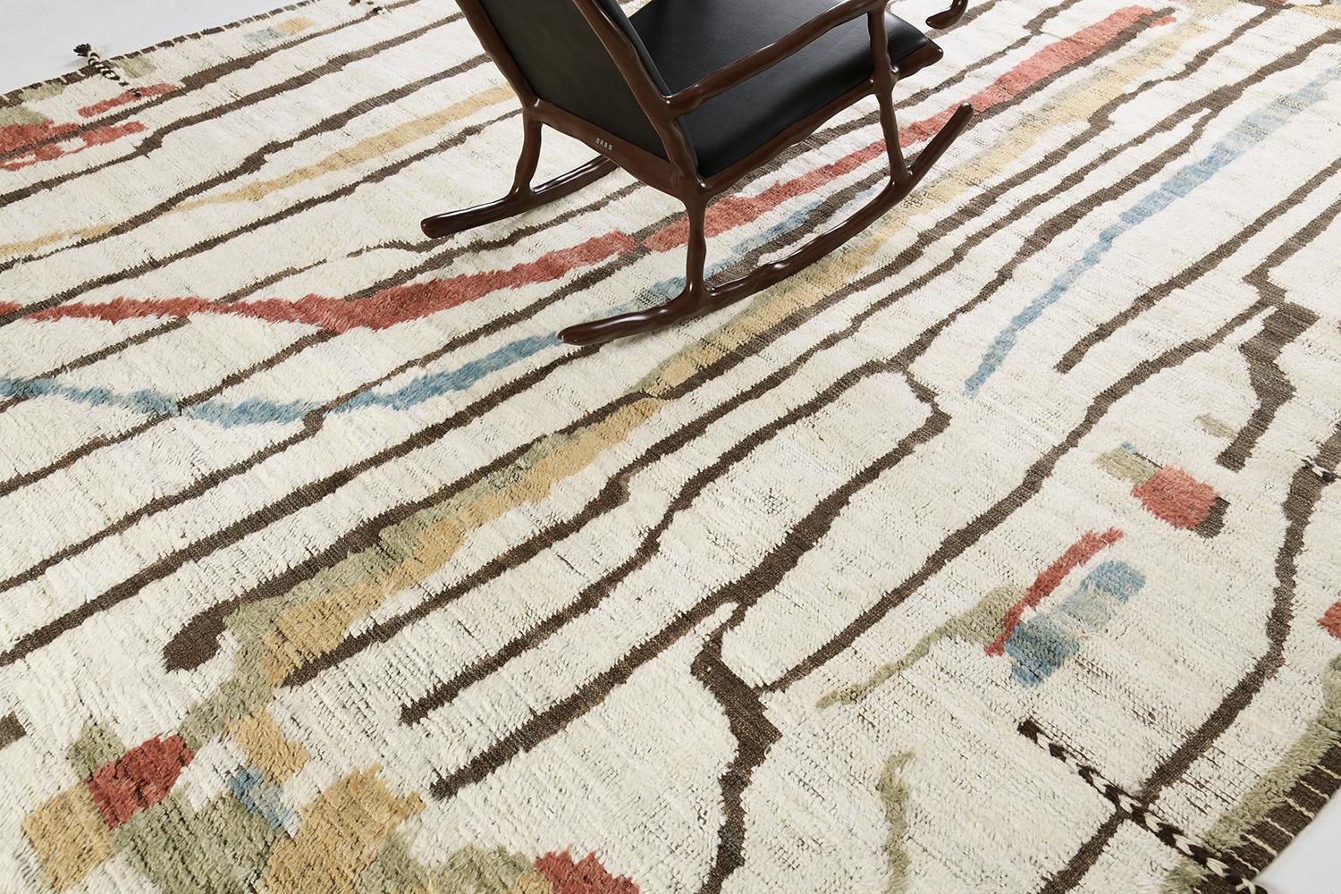 Berberis is an interplay between natural, red, and gold tones into a modern-day interpretation of the Moroccan world. This rug's play of textures, linework, and simplicity is what makes the Atlas Collection so unique and sought after. Mehraban's