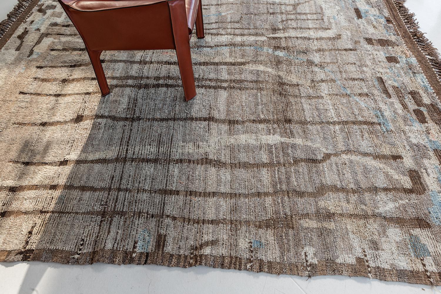 'Berberis' is an interplay between natural earth tones and cool colors into a modern day interpretation of the Moroccan world. This rug's play of textures, linework, and unique shapes is what makes the Atlas collection so unique and sought after.