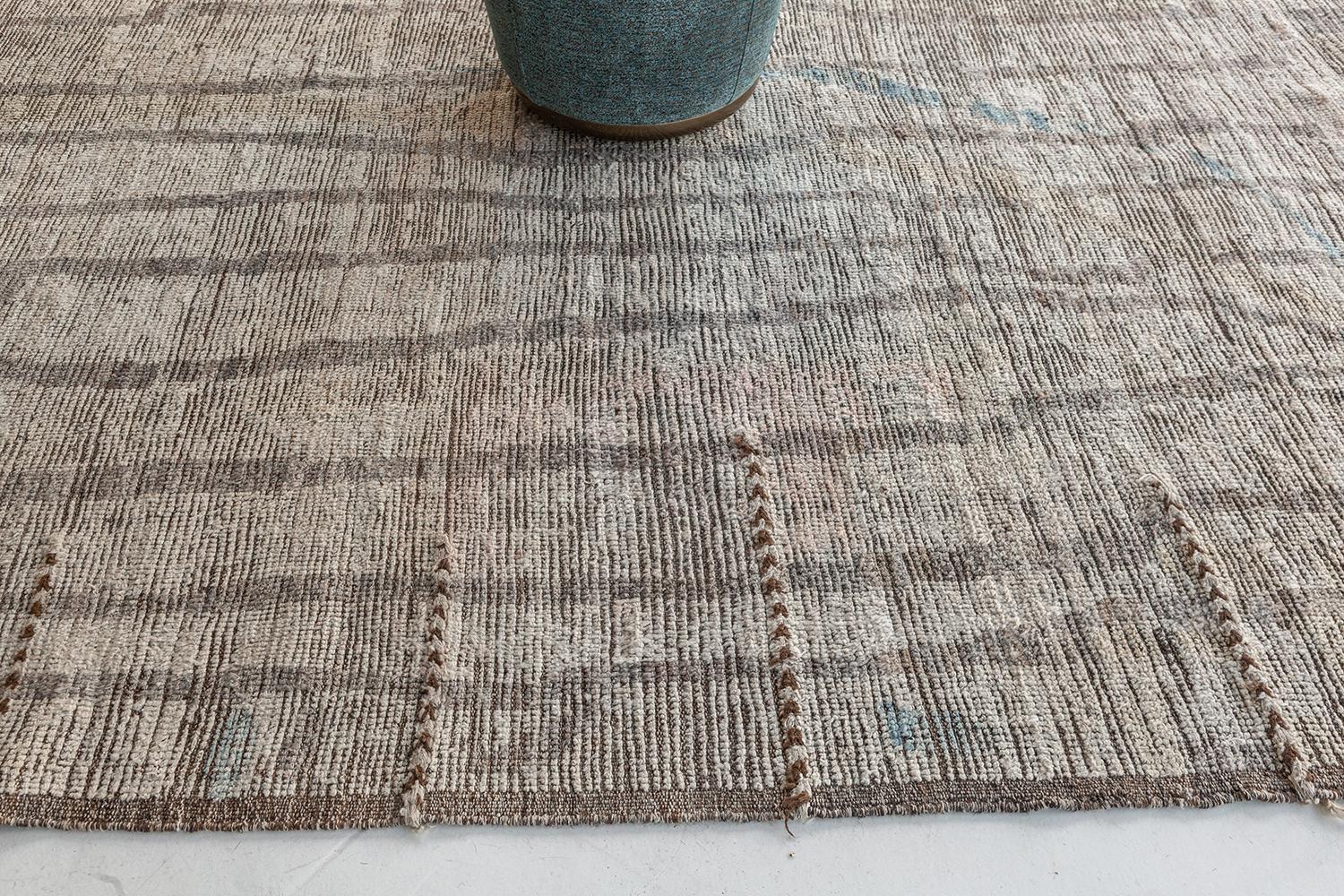 'Berberis' is an interplay between natural earth tones and soothing muted colours into a modern day interpretation of the Moroccan world. This rug's play of textures, linework, and unique shapes is what makes the Atlas Collection so unique and