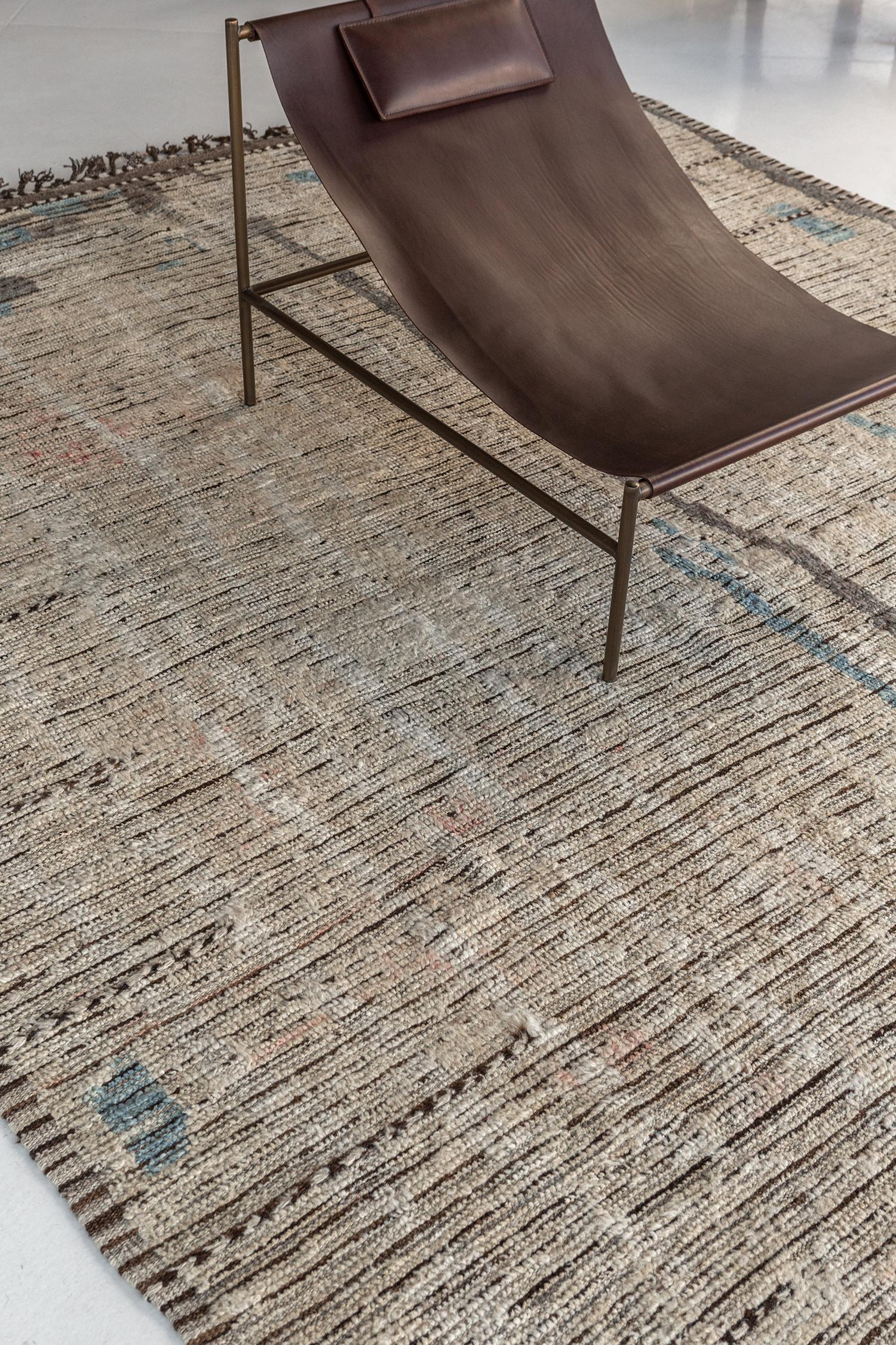 Berberis is an interplay between neutral tones and soothing muted colors into a modern-day interpretation of the Moroccan world. This rug's play of textures, line work, and unique shapes is what makes the Atlas collection so unique and sought after.
