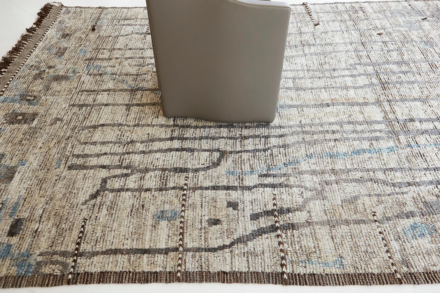 Berberis' is an interplay between natural earth tones and earthy colors into a modern-day interpretation of the Moroccan world. This rug's play of textures, linework, and unique shapes is what makes the atlas collection so unique and sought after.