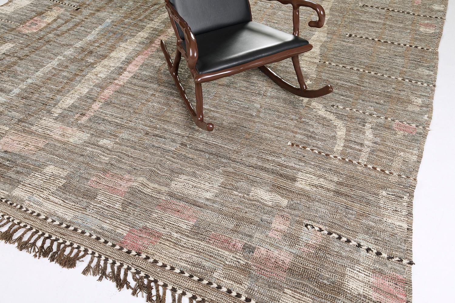 Berberis' is an interplay between natural earth tones and earthy colors into a modern day interpretation of the Moroccan world. This rug's play of textures, linework, and unique shapes is what makes the Atlas Collection so unique and sought after.