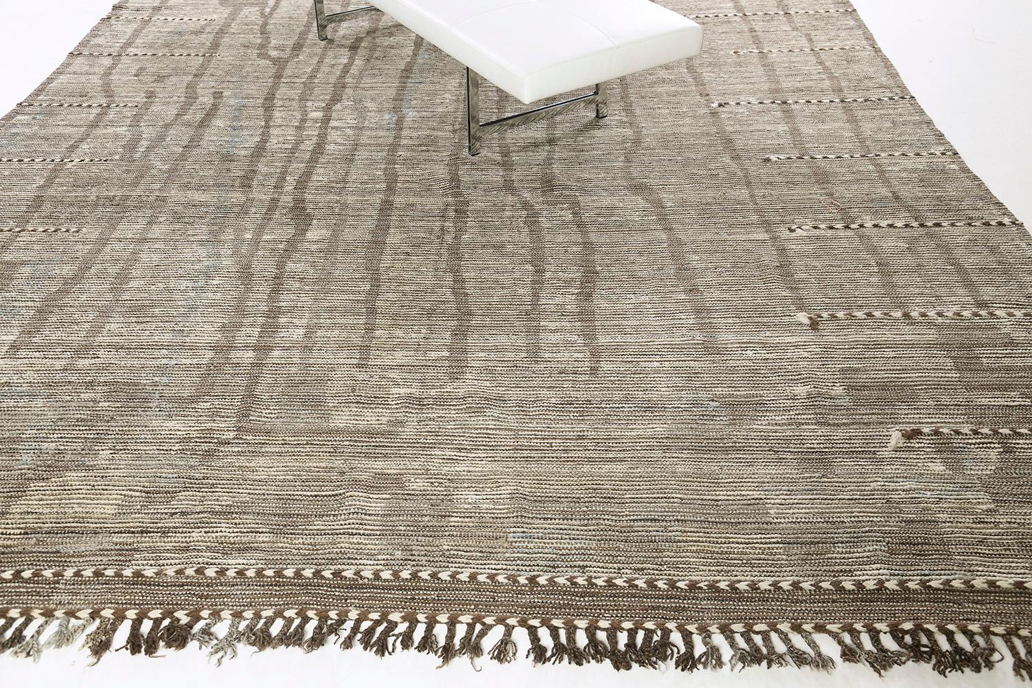 Berberis is an interplay between neutral tones and soothing shades into a modern-day interpretation of the Moroccan world. This rug's play of textures, linework, and simplicity is what makes the Atlas Collection so unique and sought after.