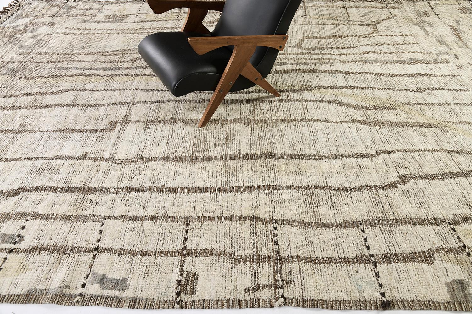 Berberis is an interplay between neutral tones and soothing gold stains into a modern-day interpretation of the Moroccan world. This rug's play of textures, linework, and simplicity is what makes the Atlas Collection so unique and sought after.