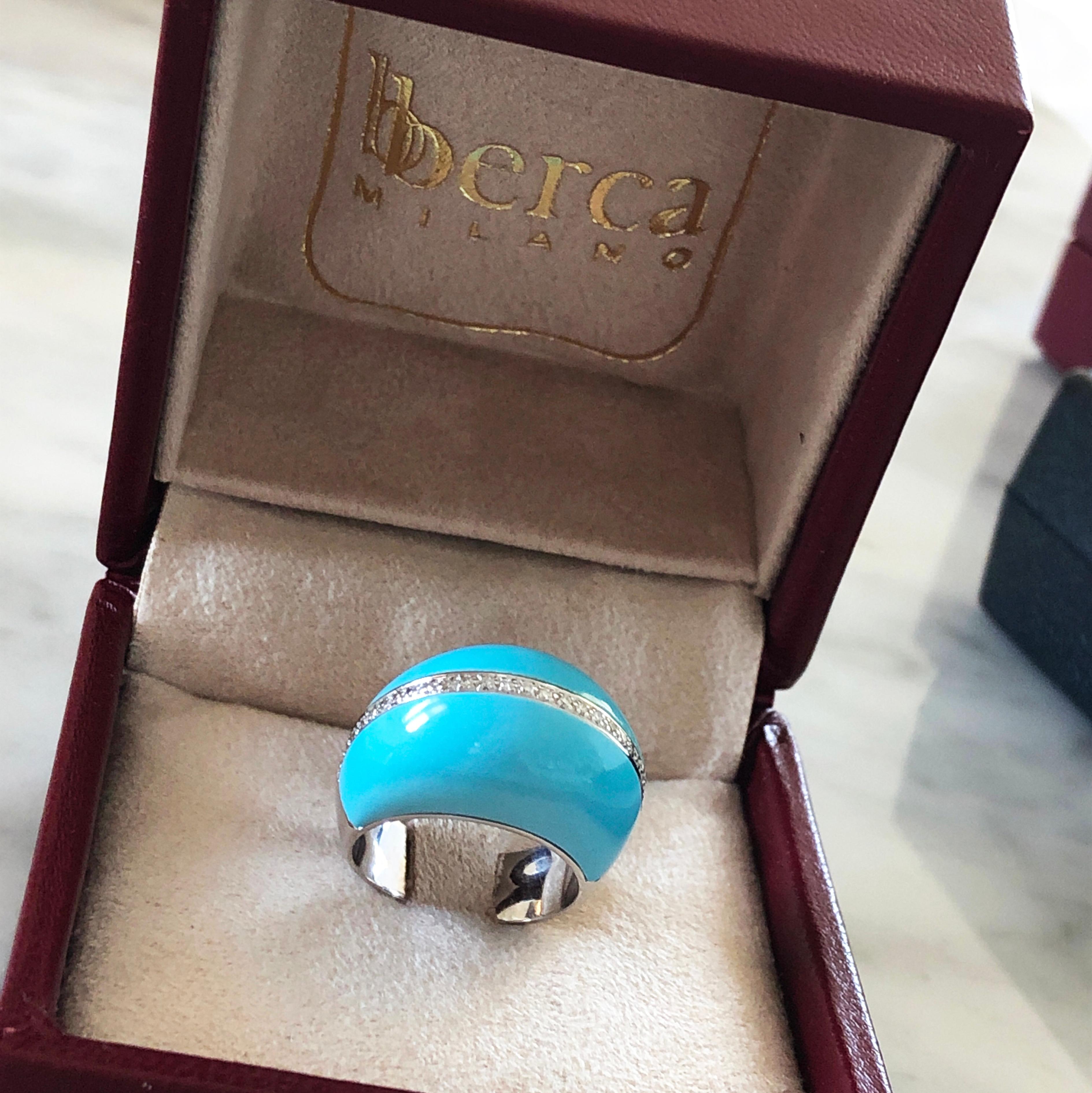 One-of-a-kind, Chic and Timeless Cocktail Ring Featuring 0.30 Carat White Diamond(D-E, IF) in a 21 Carat Natural Beautifully Hand Inlaid Turquoise, Pyramid Shaped, 18k White Gold Setting. 
A matching pair of earrings is available.
Turquoise has