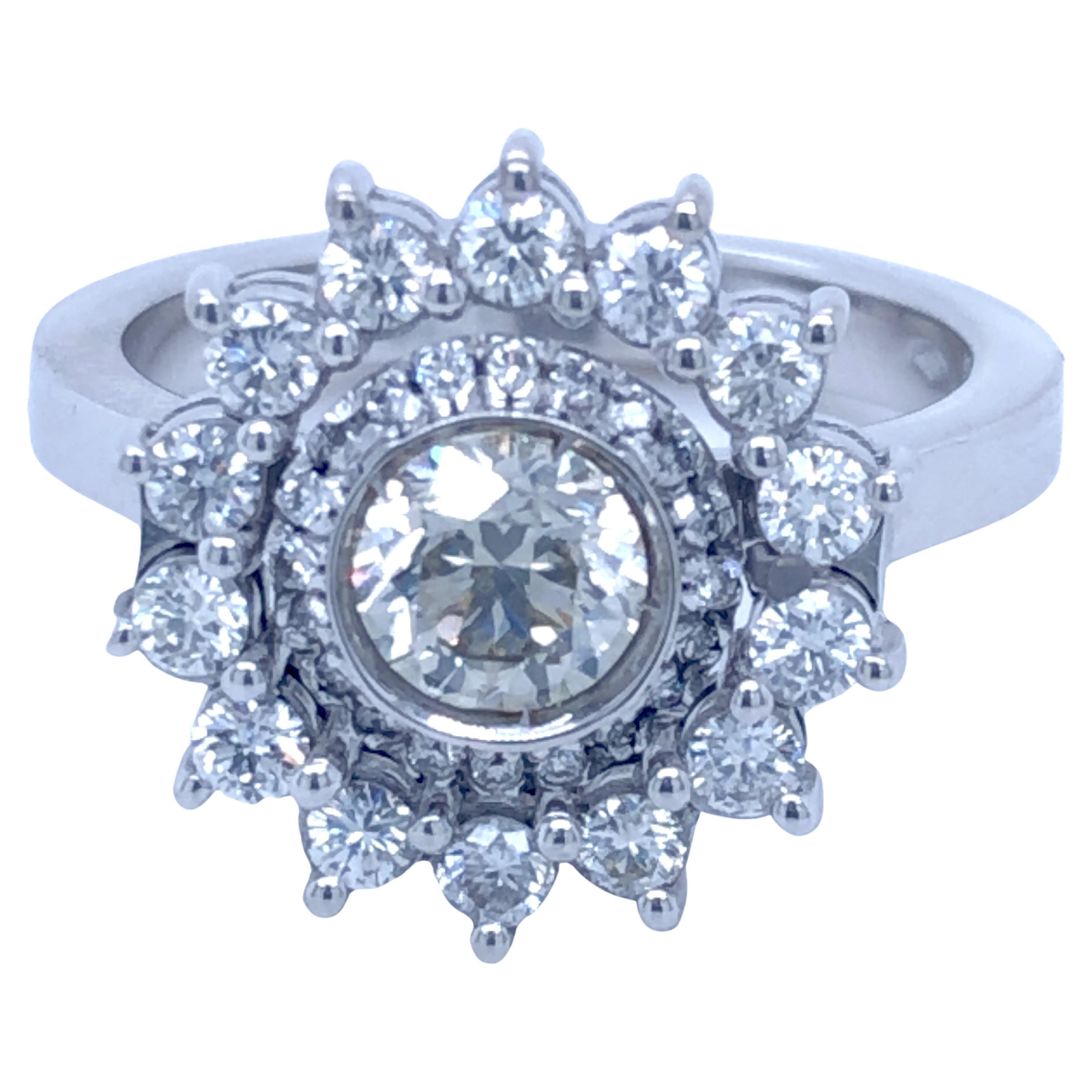 0.61 Carat AIG Certified White Diamond(H, VVS2) in a Chic yet Timeless, Sumptuous 0.78Kt White Diamond 18Kt White Gold Double Halo Setting.
AIG Report D2130171520 October 24 2021,  is included.
In our fitted burgundy leather case, beautifully gift