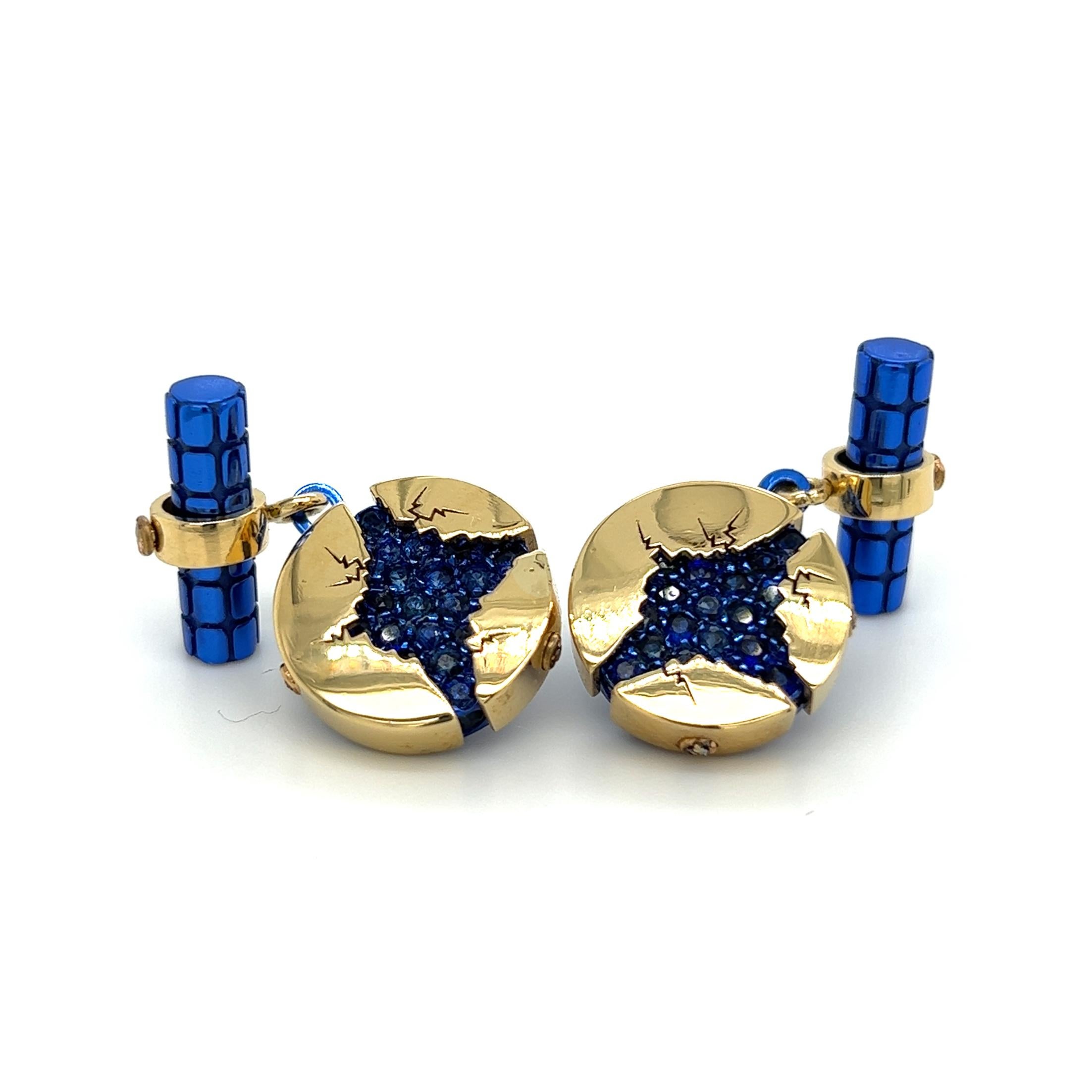 BERCA cufflinks in 18 kt natural and oxidized yellow gold, brilliant blue, 1.25 ct natural blue sapphires. inspired by the sculpture by Arnaldo Pomodoro in Milan, Piazza Meda. 
This jewel is a sign of BERCA's love for its city Milan.
Absolutely