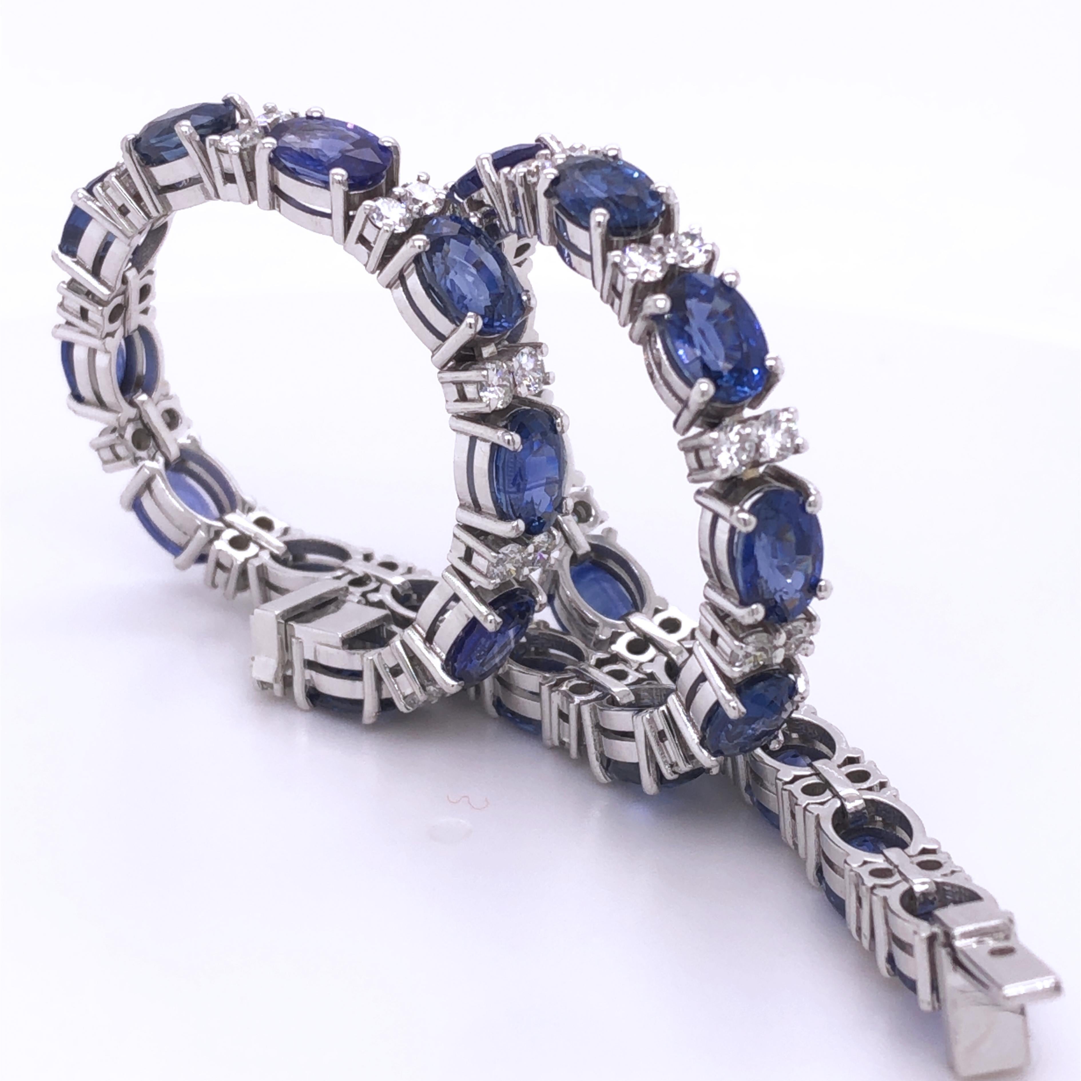Timeless Hancrafted Tennis Bracelet featuring 23 Natural Oval Ceylon Sapphire, in a 1.79Kt Top Quality Brilliant Cut White Diamond, in a 0.49OzT 18kt White Gold Setting. 
Diamond's Grade is D-E, VvS1.
A detailed gemmological certificate is