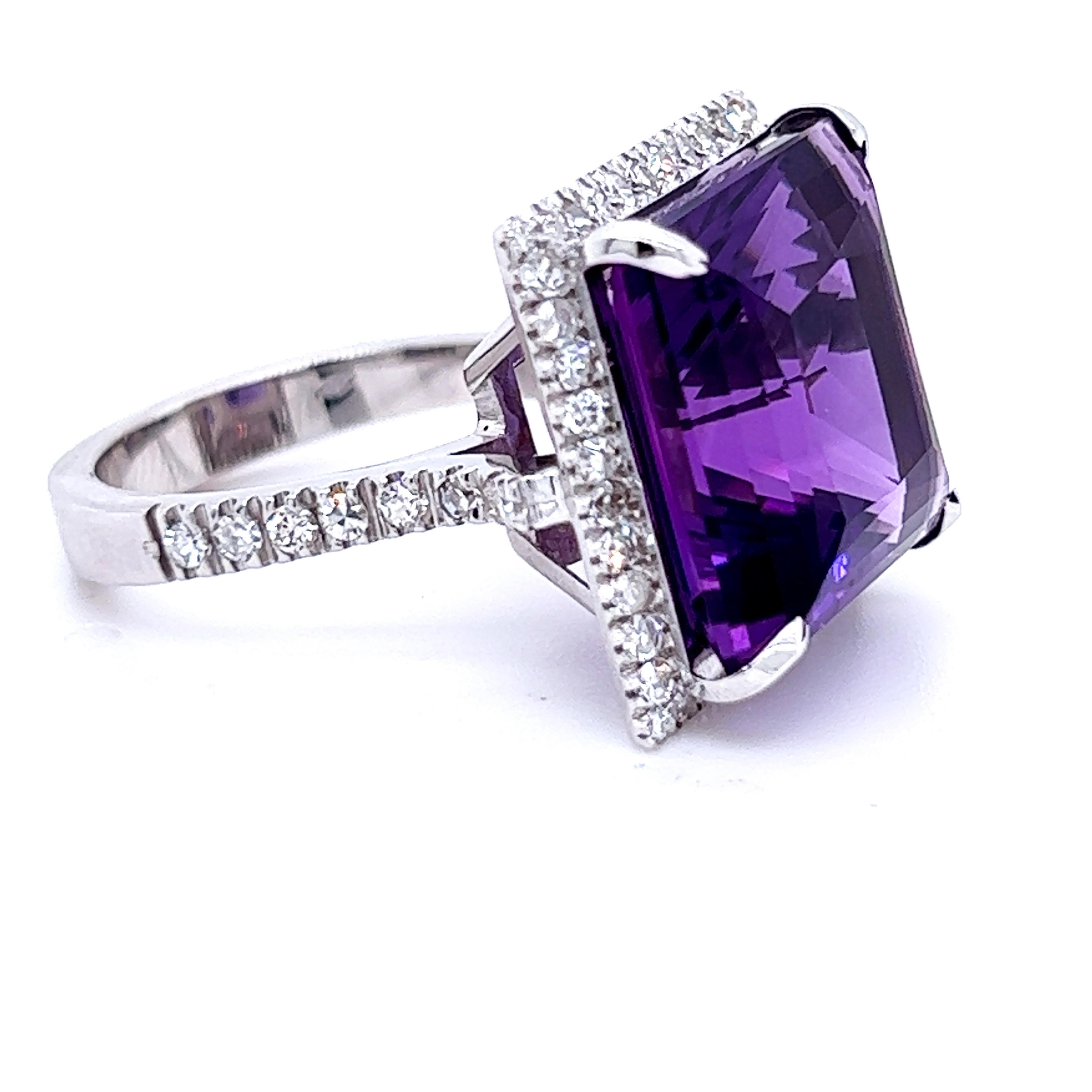 Sumptuous and One-of-a-kind Cocktail Ring featuring a 15.51 Carat Princess Cut Natural Velvety Purple Amethyst in an 1.09Carat, 66 brilliant cut, top quality White Diamond 18 Carat White Gold Setting.
In our fitted Dark Brown Suede Leather