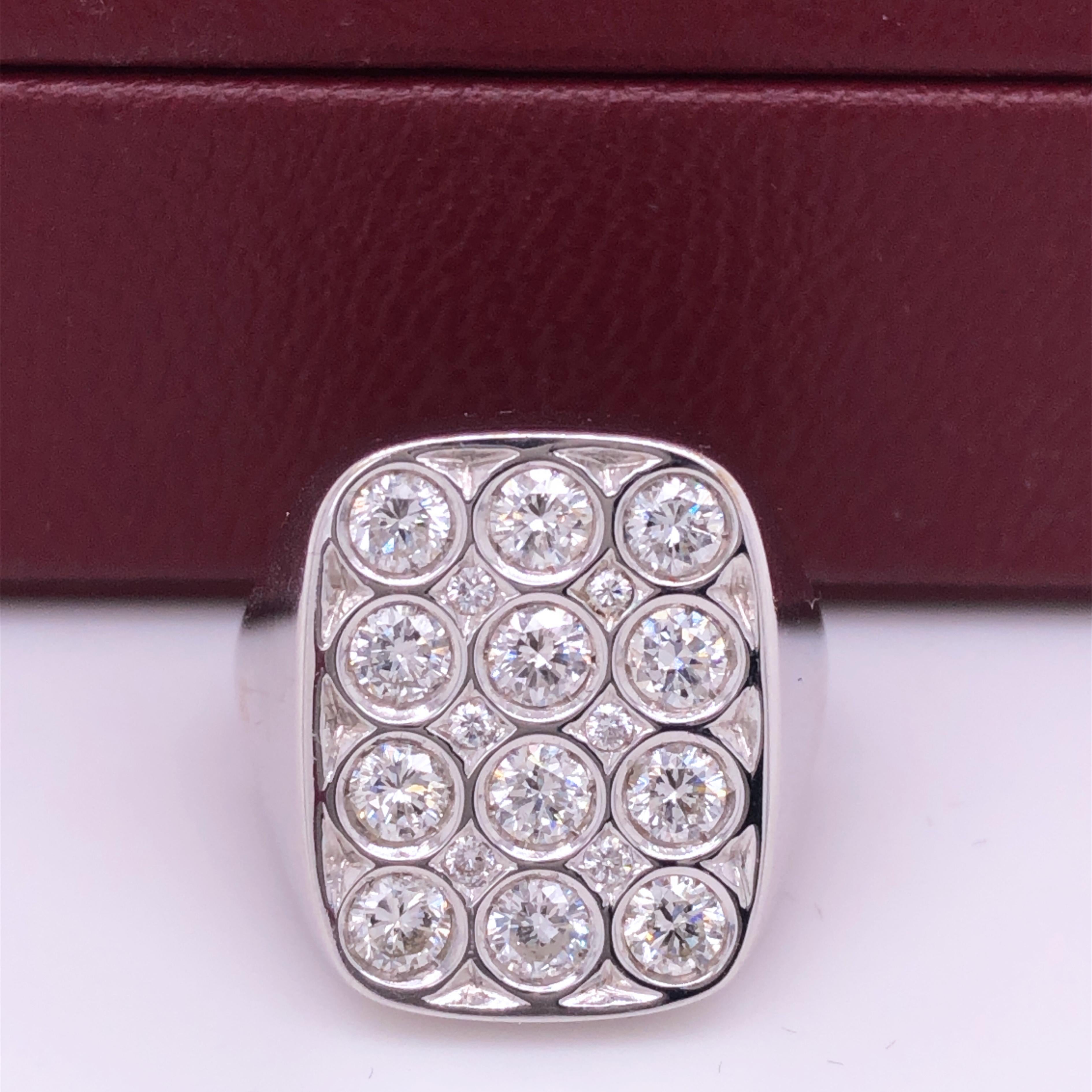 Chic yet Unique Contemporary Cocktail Ring featuring 1.56, 18 (D-E, IF) White Diamond Brilliant Cut, in a Minimalist, Refined 18Kt Mirror Finish White Gold Setting.
Us Size 6 1/2, French Size 53.
In our fitted burgundy leather case.

We are pleased